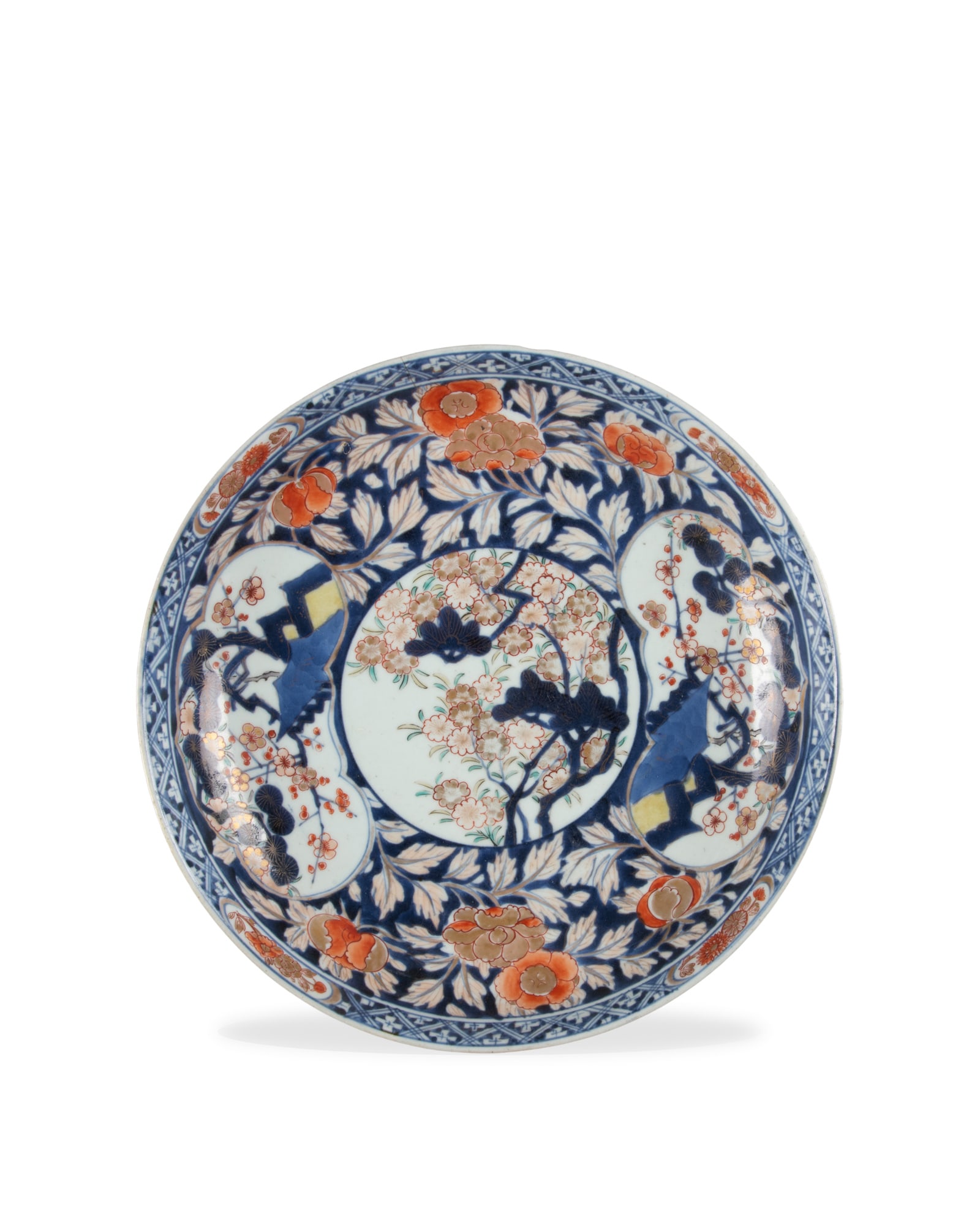 A BLUE AND WHITE WITH IRON-RED AND GILT IMARI 'FLOWER' CHARGER Japan, 18-19th century D.31.8cm: A BLUE AND WHITE WITH IRON-RED AND GILT IMARI 'FLOWER' CHARGER Japan, 18-19th century D.31.8cm