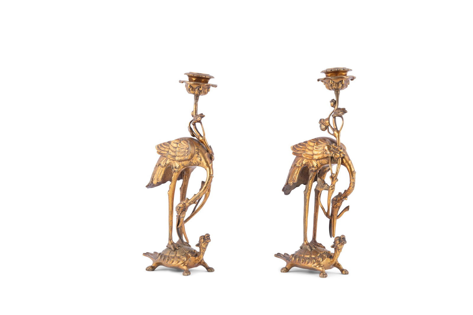 A PAIR OF GILT COPPER 'CRANES AND TURTLES' CANDLE STANDS Japan, Meiji period H.26.3cm ***PLEASE: A PAIR OF GILT COPPER 'CRANES AND TURTLES' CANDLE STANDS Japan, Meiji period H.26.3cm ***PLEASE NOTE: THIS LOT IS NOT ON VIEW IN IRELAND. POST-SALE COLLECTION IS TO BE ARRANGED BY THE BUYER FROM OUR P