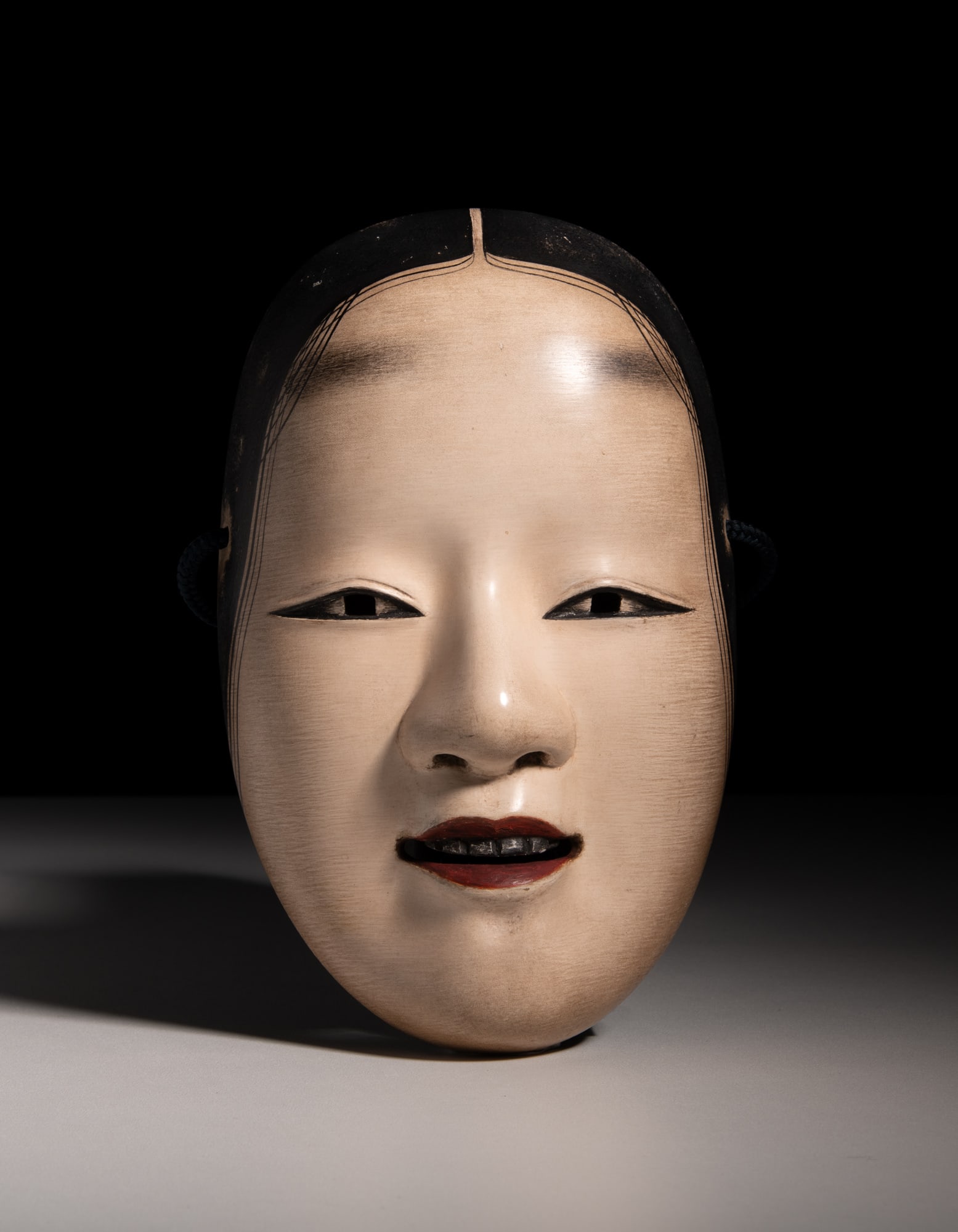 A NOH MASK OF KO-OMOTE (小面) Japan, Signed Ga (雅), 20th century H.20.4cm (1 of 4)