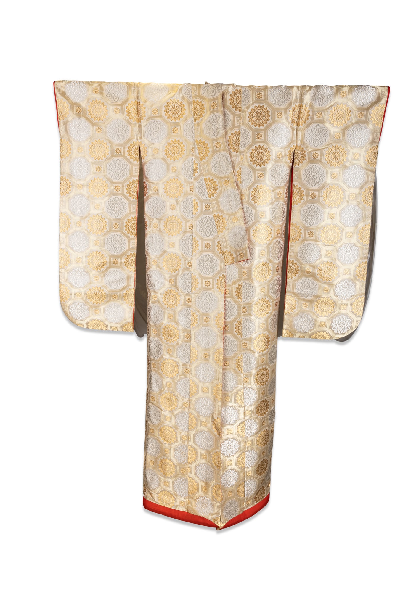 A JAPANESE GOLD AND SILVER SILK UCHIKAKE Japan, 20th century of traditional form, woven with a: A JAPANESE GOLD AND SILVER SILK UCHIKAKE Japan, 20th century of traditional form, woven with a dense gold and silver silk brocade featuring a repeating geometric and floral lattice. The garment is dec