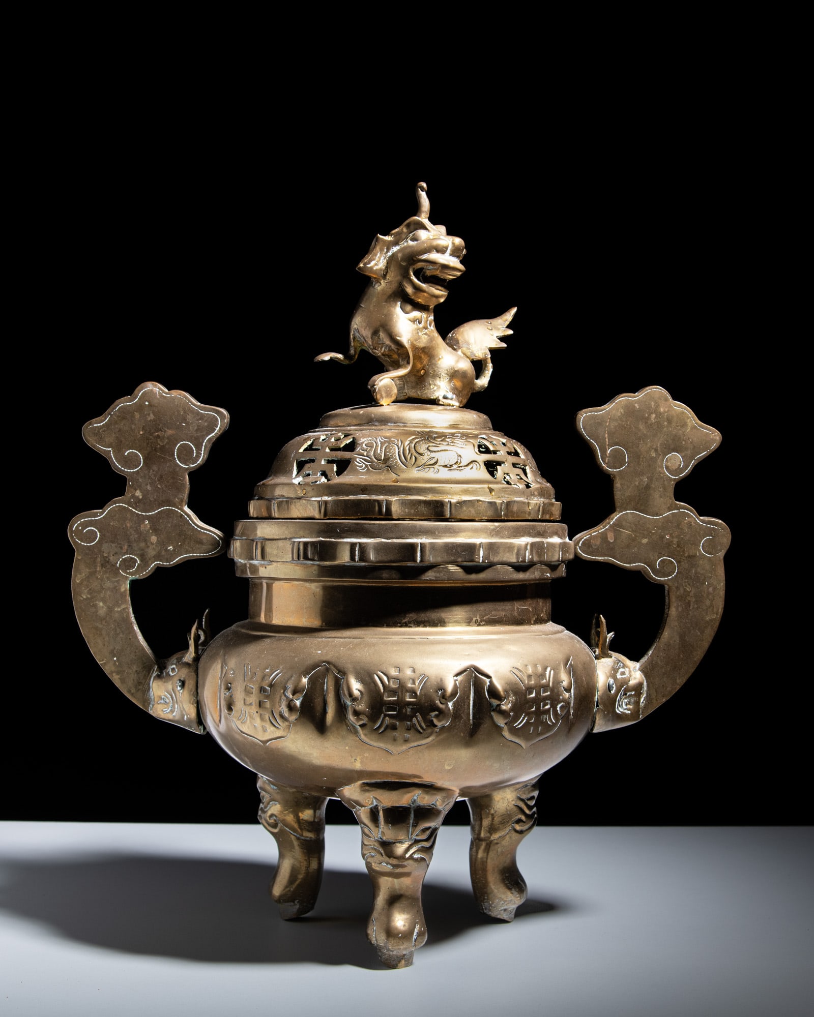 A GILT BRASS INCENSE BURNER WITH LION-TOPPED COVER Vietnam, late 19th–early 20th century H.  (1 of 2)