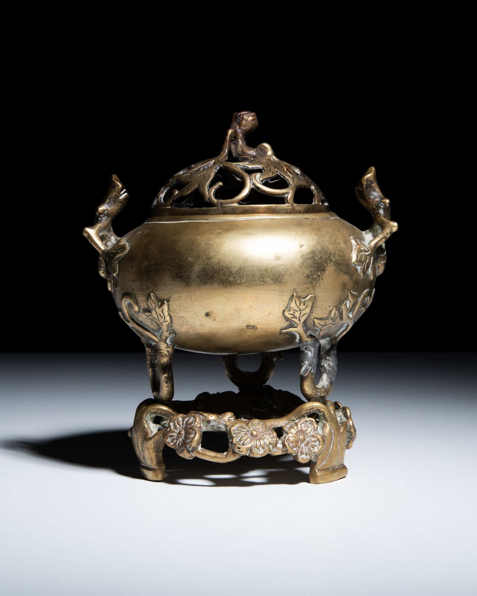 A BRASS ‘FLOWER’ INCENSE BURNER, COVER AND STAND Vietnam, 20th century. The pierced (1 of 6)