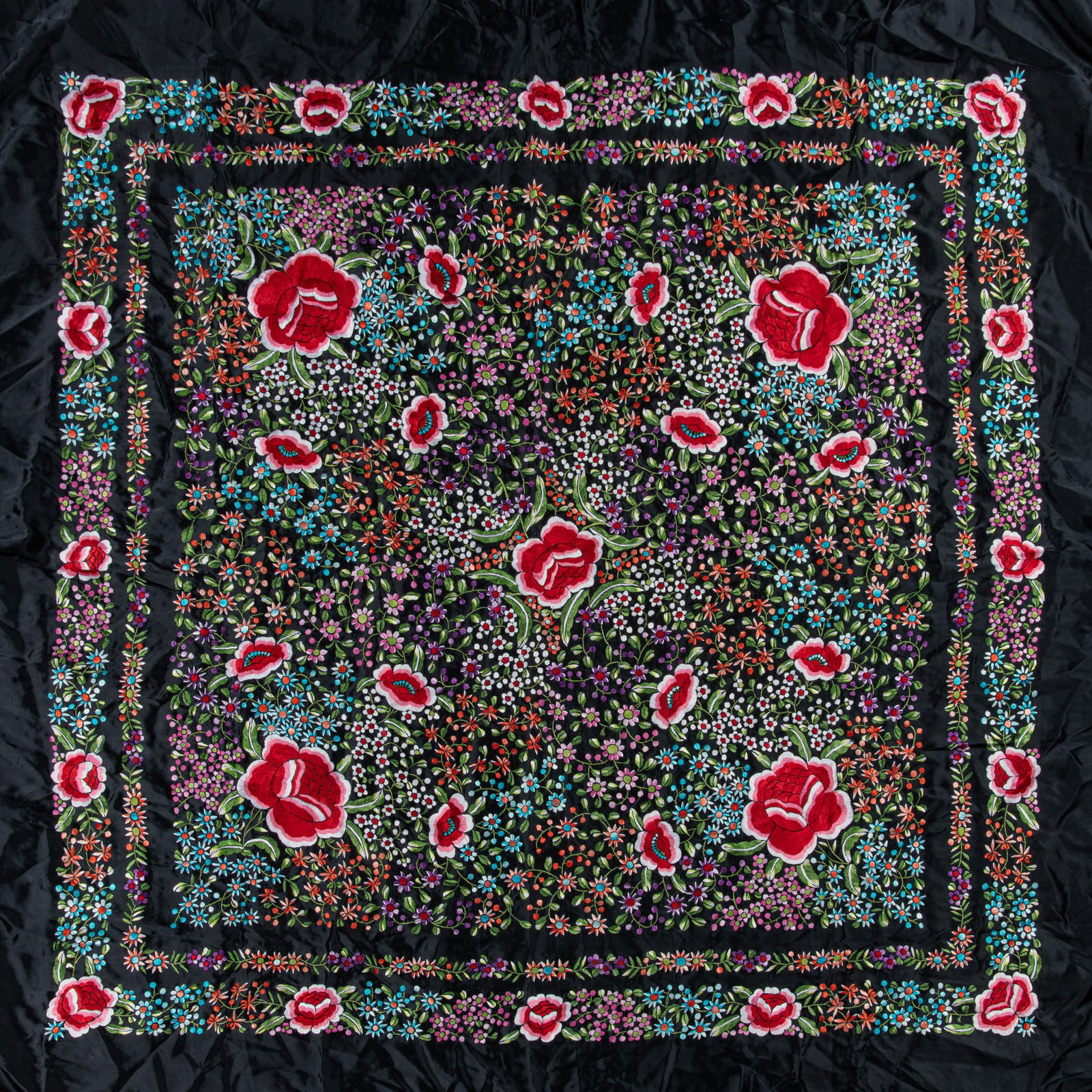 TWO BLACK-GROUND SILK SHAWLS WITH COLOURED THREAD-EMBROIDERED ‘FLOWERS’ DESIGN China, (1 of 4)