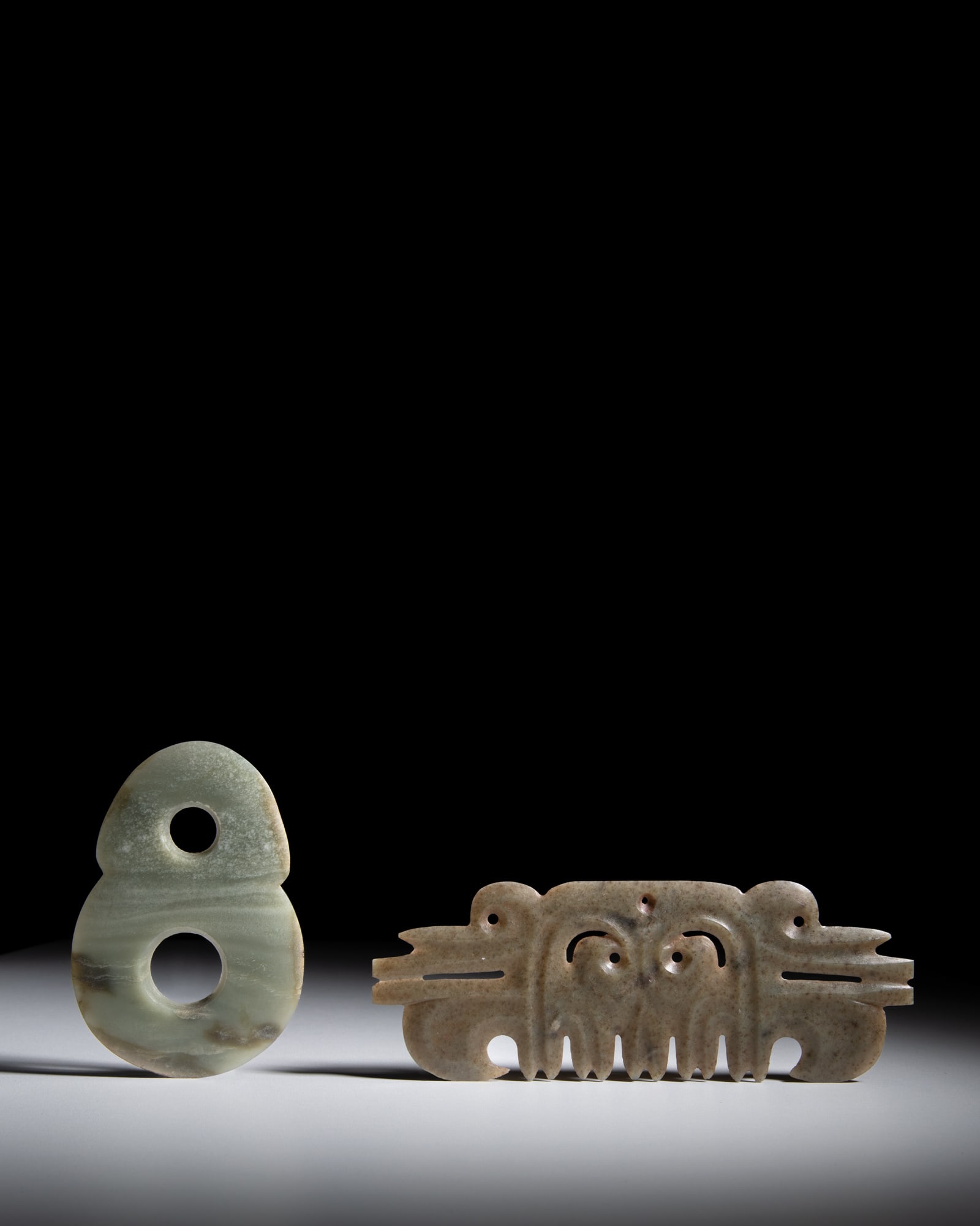 TWO NEOLITHIC STYLE CELADON JADES 红山文化风格 青玉: TWO NEOLITHIC STYLE CELADON JADES 红山文化风格 青玉勾云珮及双联璧 China, Hongshan culture style L(scroll cloud