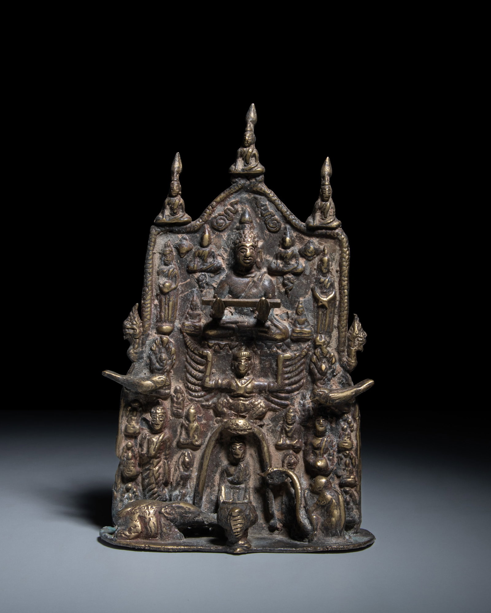 A HIGH RELIEF BRONZE BUDDHIST DEVOTIONAL PLAQUE Thailand, 20th Century Illustrated with the (1 of 2)