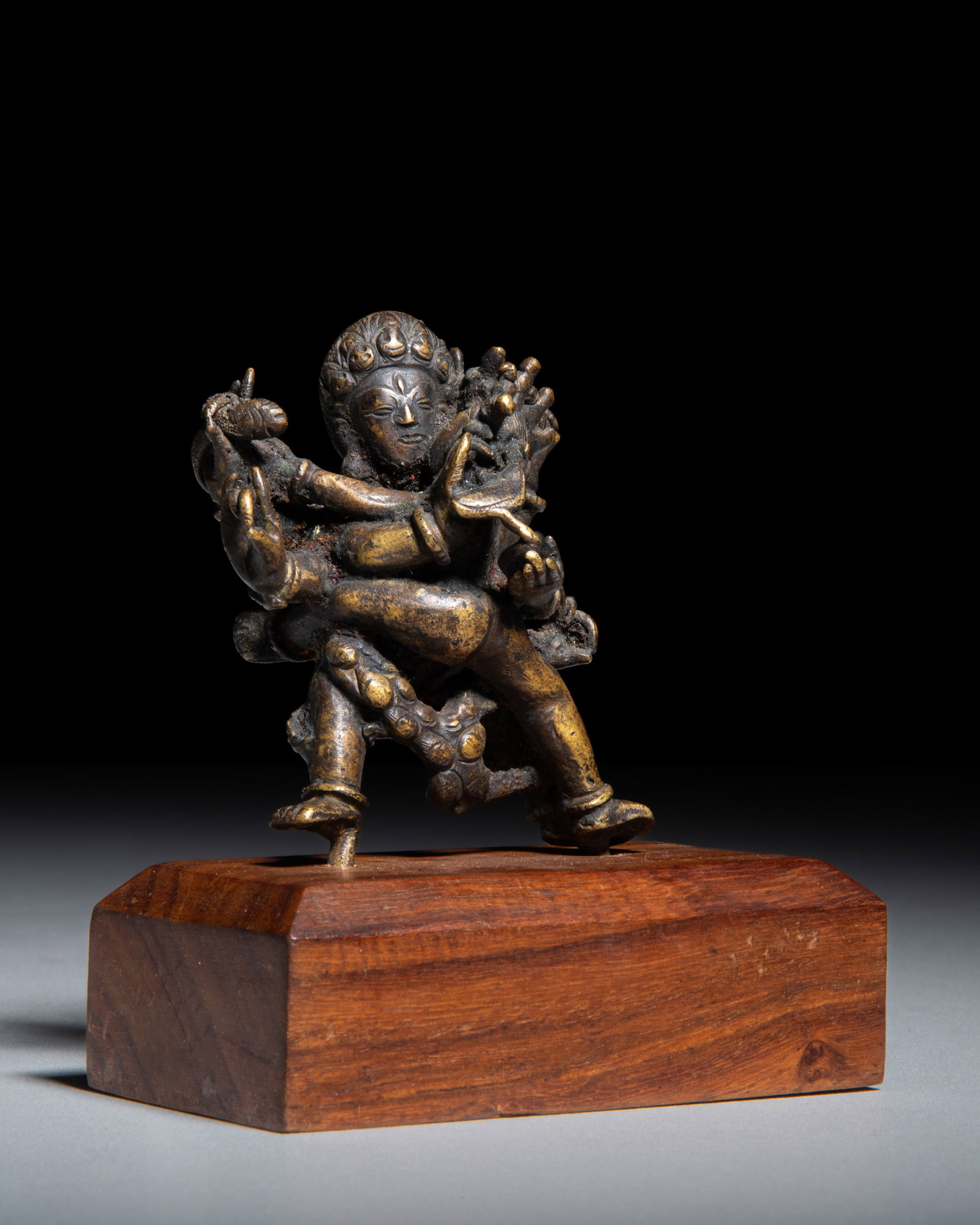 A SMALL COPPER ALLOY FIGURE OF YAMANTAKA IN YAB-YUM WITH SHAKTI Nepal, early-mid-20th Century H: (1 of 3)