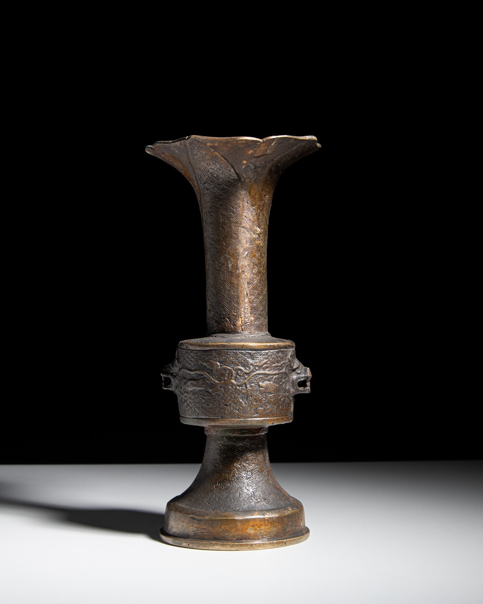 A BRONZE ARCHAISTIC 'CHILONG' GU VASE 明代 仿古螭龙纹 (1 of 3)