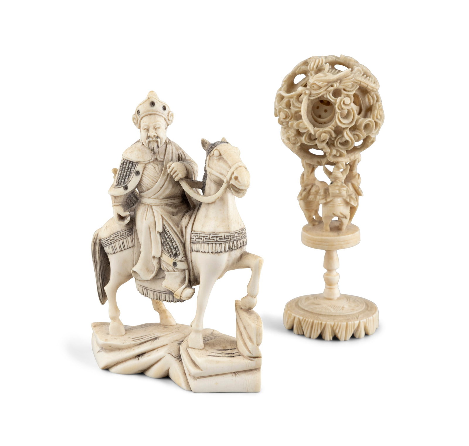 AN IVORY FIGURE OF A KNIGHT ON A HORSE, together with an ivory puzzle ball (2) (1 of 5)