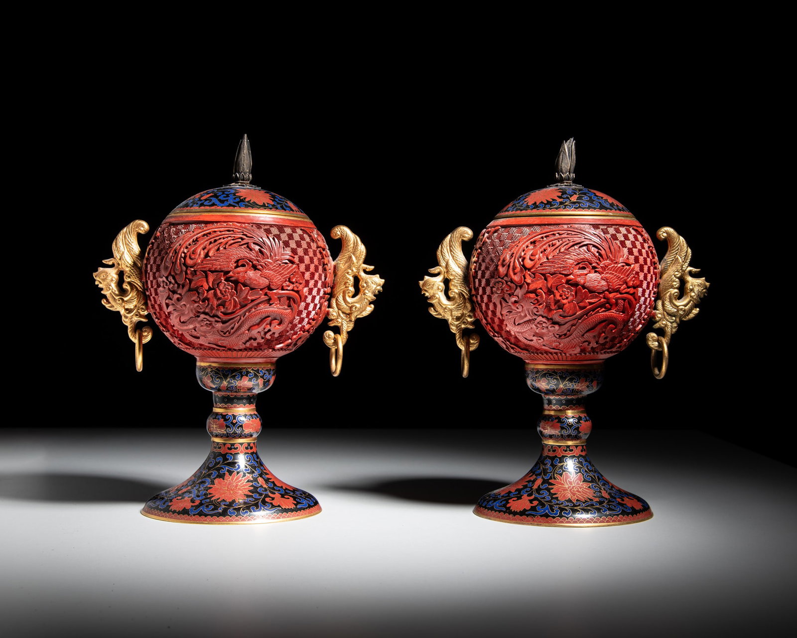 A PAIR OF CLOISONNÉ ENAMEL AND CARVED RED LACQUER 'PHOENIX AND LOTUS' DOU-TYPE VESSELS (1 of 3)