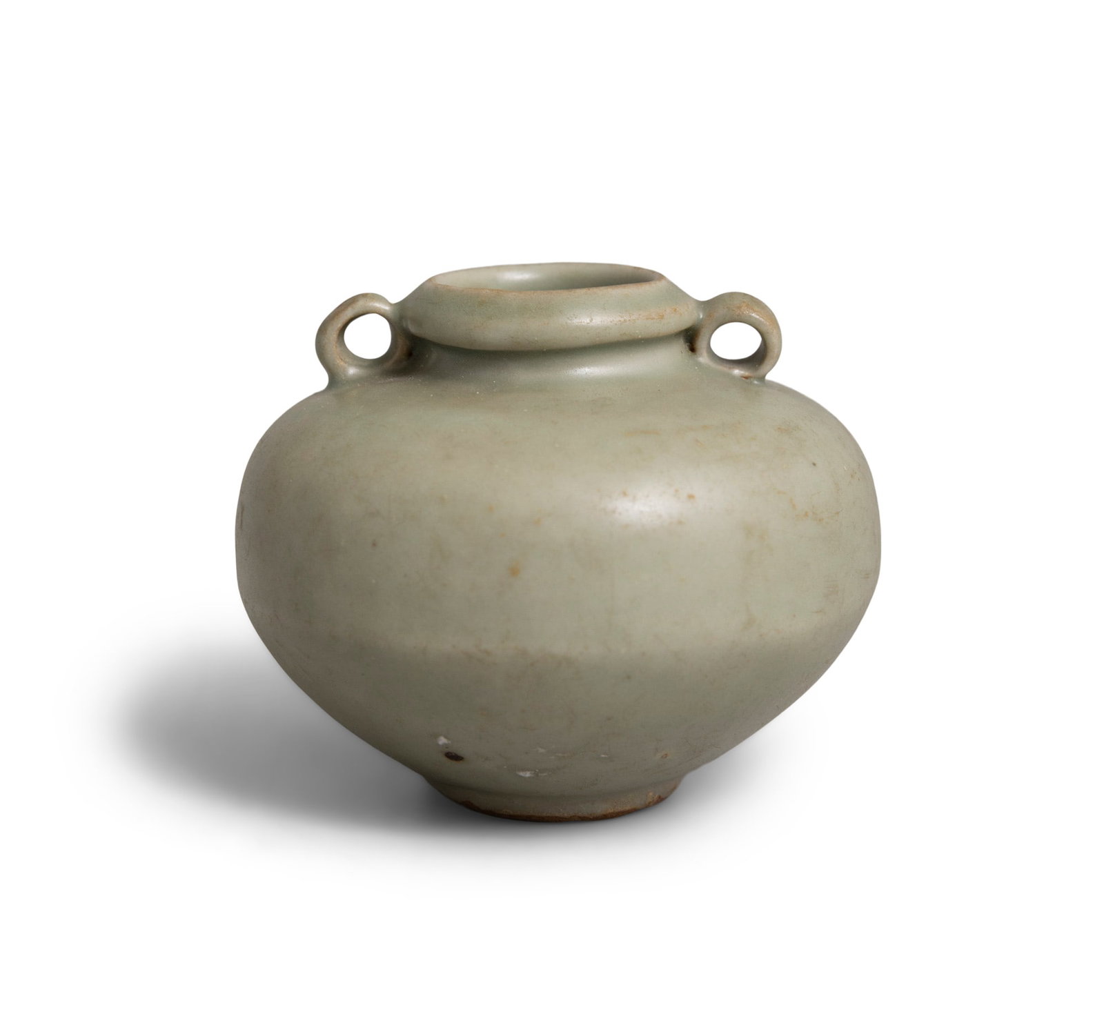 A SMALL LONGQUAN DOUBLE LOOP HANDLED JAR 元代 龙泉双系小: A SMALL LONGQUAN DOUBLE LOOP HANDLED JAR 元代 龙泉双系小罐 China, Yuan dynasty H.6.5cm