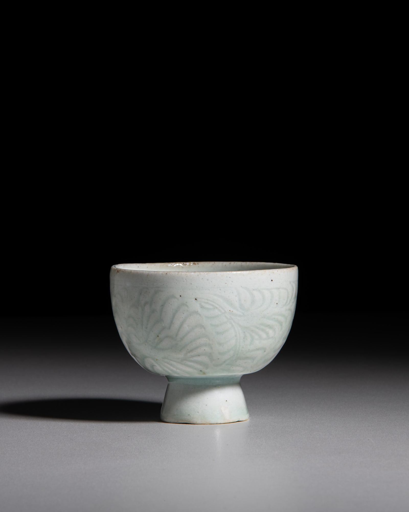 A SMALL HUTIAN CARVED FLORAL STEM CUP 宋代 湖田窑刻花 (1 of 4)