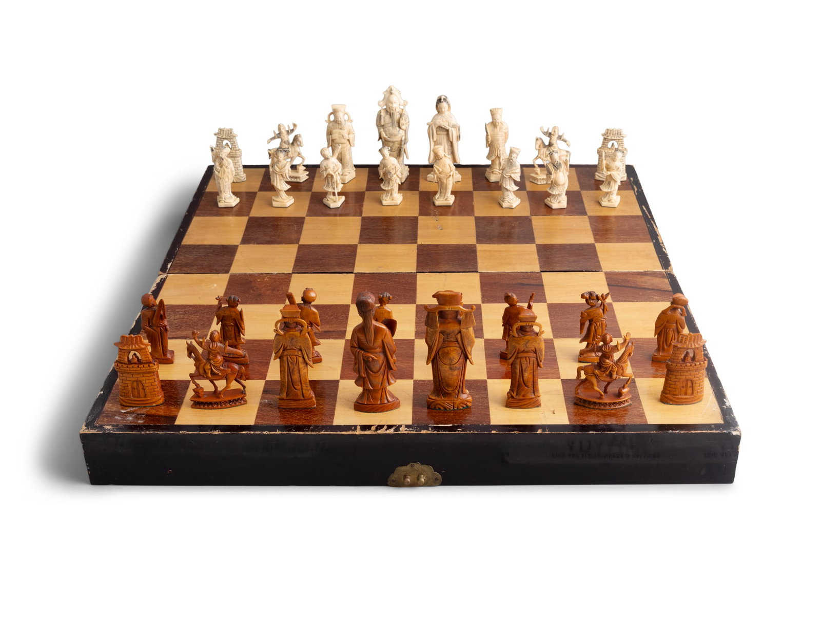 *A CHINESE EXPORT CARVED IVORY TAOIST-STYLE FIGURAL CHESS SET China, Canton, early 20th century (1 of 8)