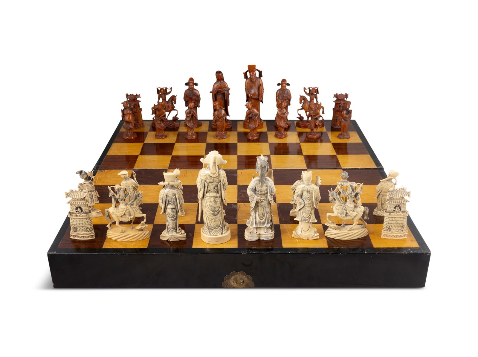 *AN IMPORTANT CHINESE EXPORT CARVED IVORY TAOIST-STYLE FIGURAL CHESS SET China, Canton, early 20th (1 of 15)