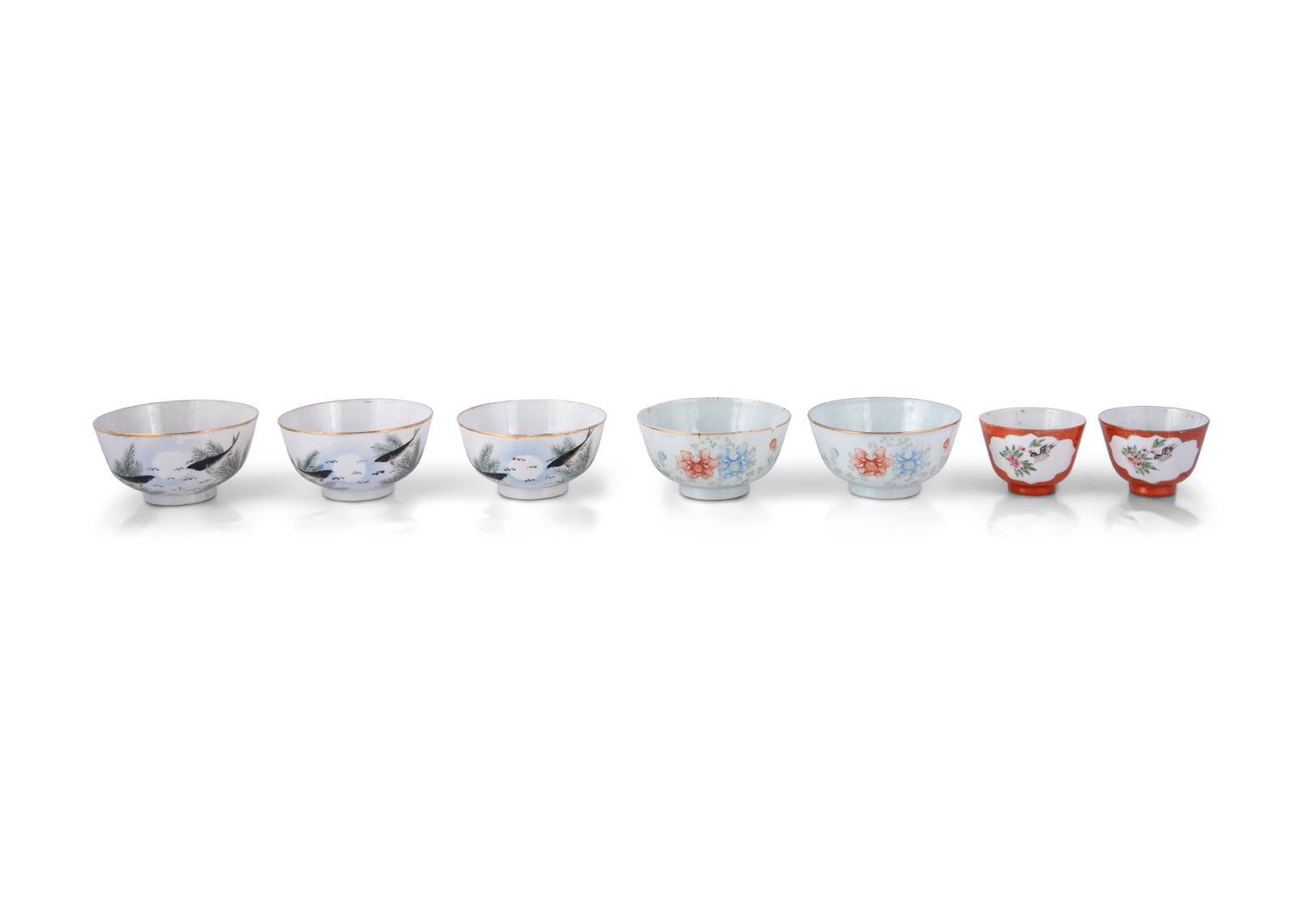 A GROUP OF FAMILLE ROSE PORCELAIN BOWLS AND TEACUPS China, late 19th - early 20th century: A GROUP OF FAMILLE ROSE PORCELAIN BOWLS AND TEACUPS China, late 19th - early 20th century Including three bowls with carp, two bowls with flowers, signed 'Taochang Chupin'; two iron red with birds and