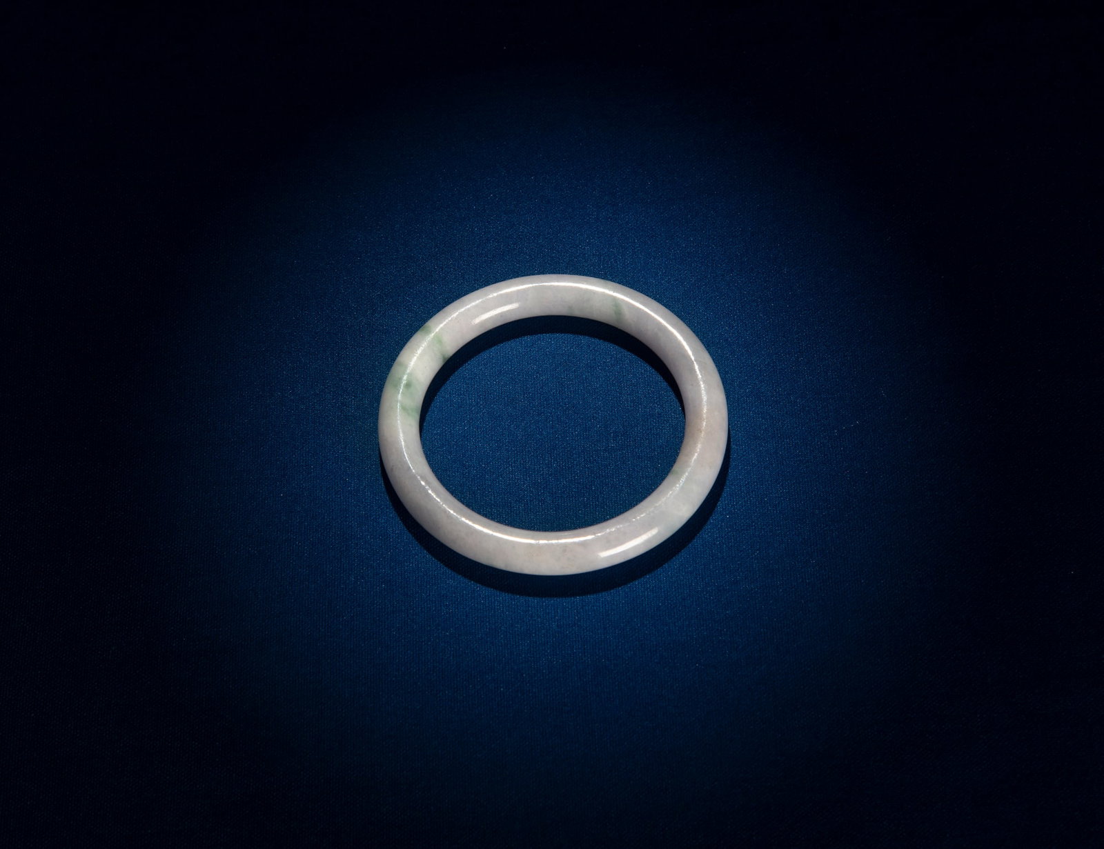A JADEITE BANGLE China D.(outside)7.7cm - (inside)5.8cm (1 of 2)