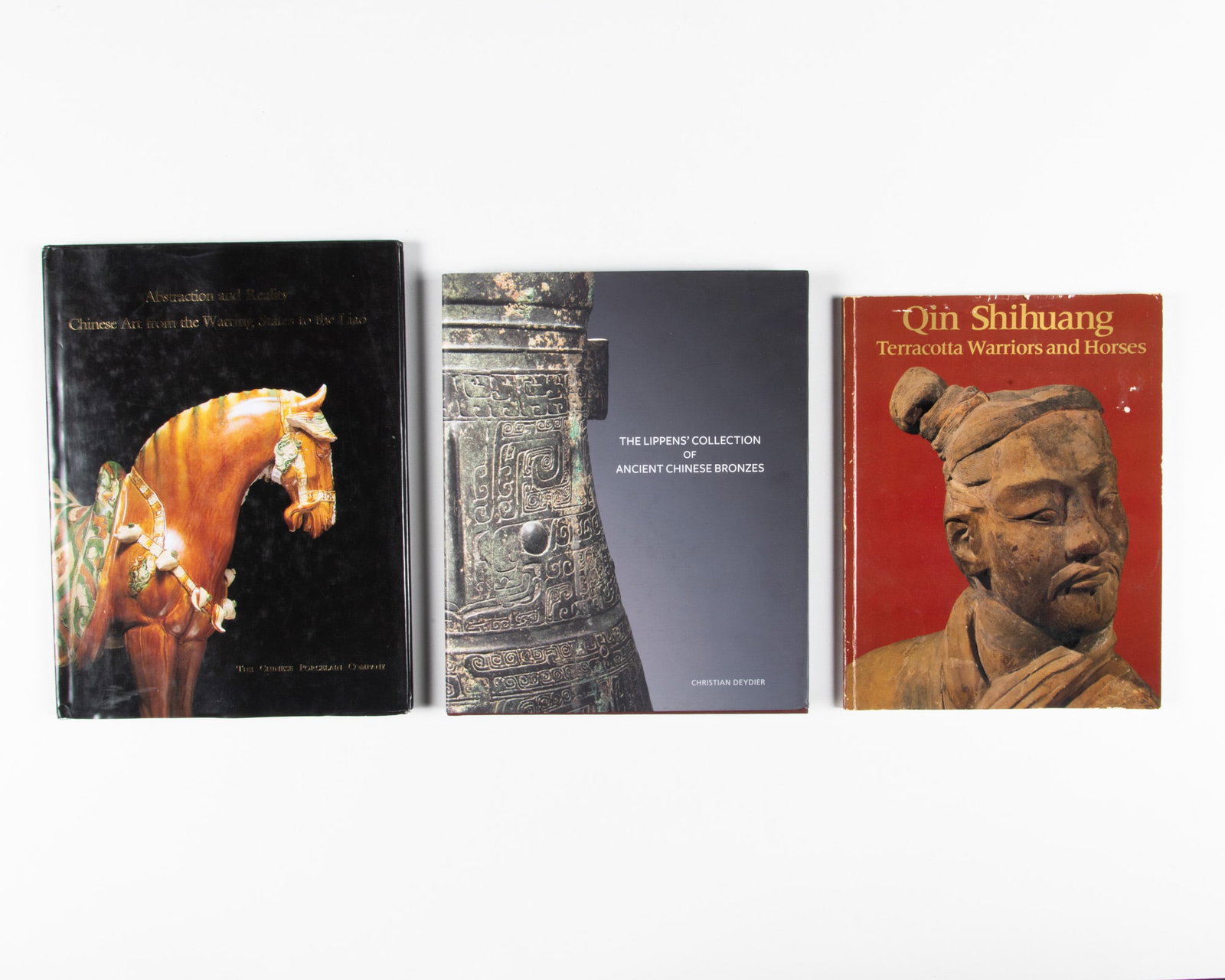 A COLLECTION OF THREE CHINESE ANTIQUE CATALOGUE BOOKS -Qin Shihuang Terracotta Warriors and Horses,: A COLLECTION OF THREE CHINESE ANTIQUE CATALOGUE BOOKS -Qin Shihuang Terracotta Warriors and Horses, Edmund Capon, 3rd edition, 1983 -Abstraction and Reality, Chinese Art from the Warring States to the