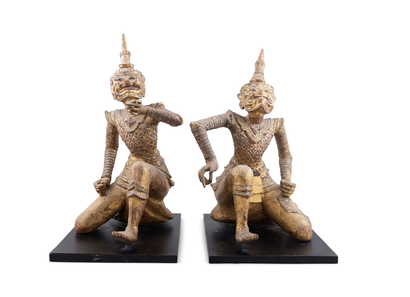 TWO GILT CARVED WOOD INLAID WITH MICA FIGURES OF FIERCE RAKSHASA DEMONS Burma or Thailand, early (1 of 4)