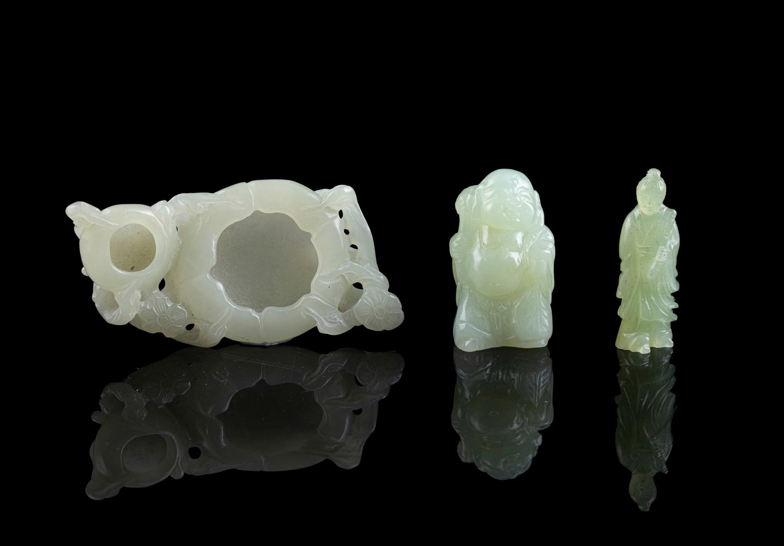 A GROUP OF THREE SERPENTINE CARVINGS China, second half of 20h century including two figures and: A GROUP OF THREE SERPENTINE CARVINGS China, second half of 20h century including two figures and a brush pot in gourd shape H.5.5-9.7cm