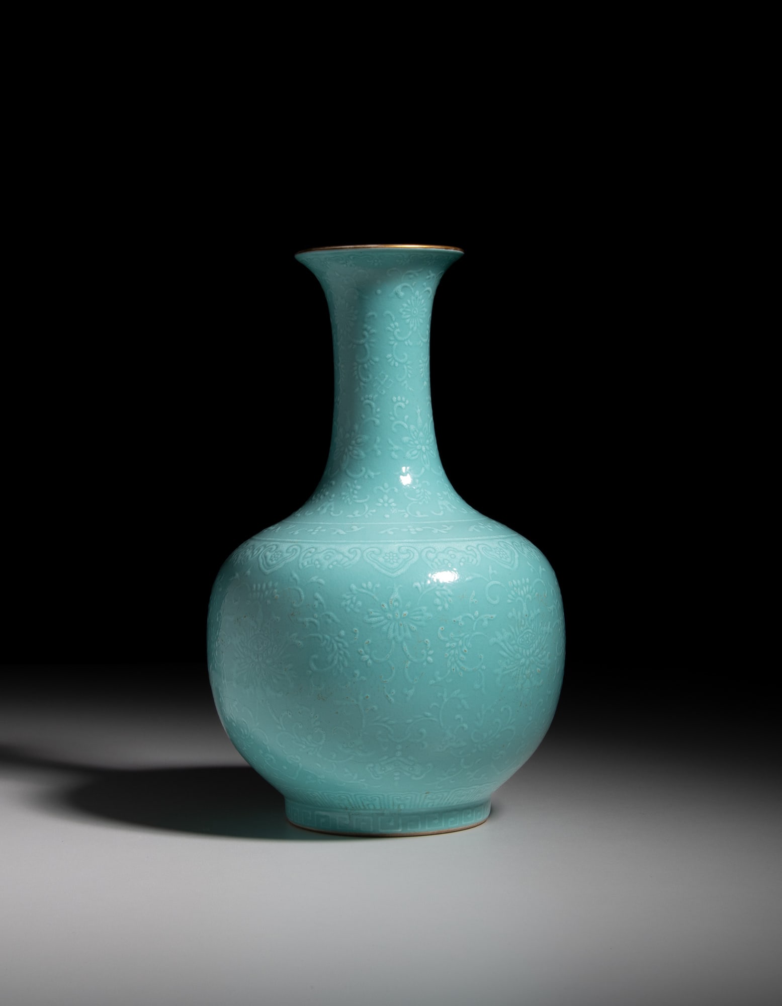 A TURQUOISE GROUND 'LOTUS' VASE, MARKED DAOGUANG 清代 道光年制: A TURQUOISE GROUND 'LOTUS' VASE, MARKED DAOGUANG 清代 道光年制款 松石绿釉西番莲纹瓶 China, Qing dynasty 
