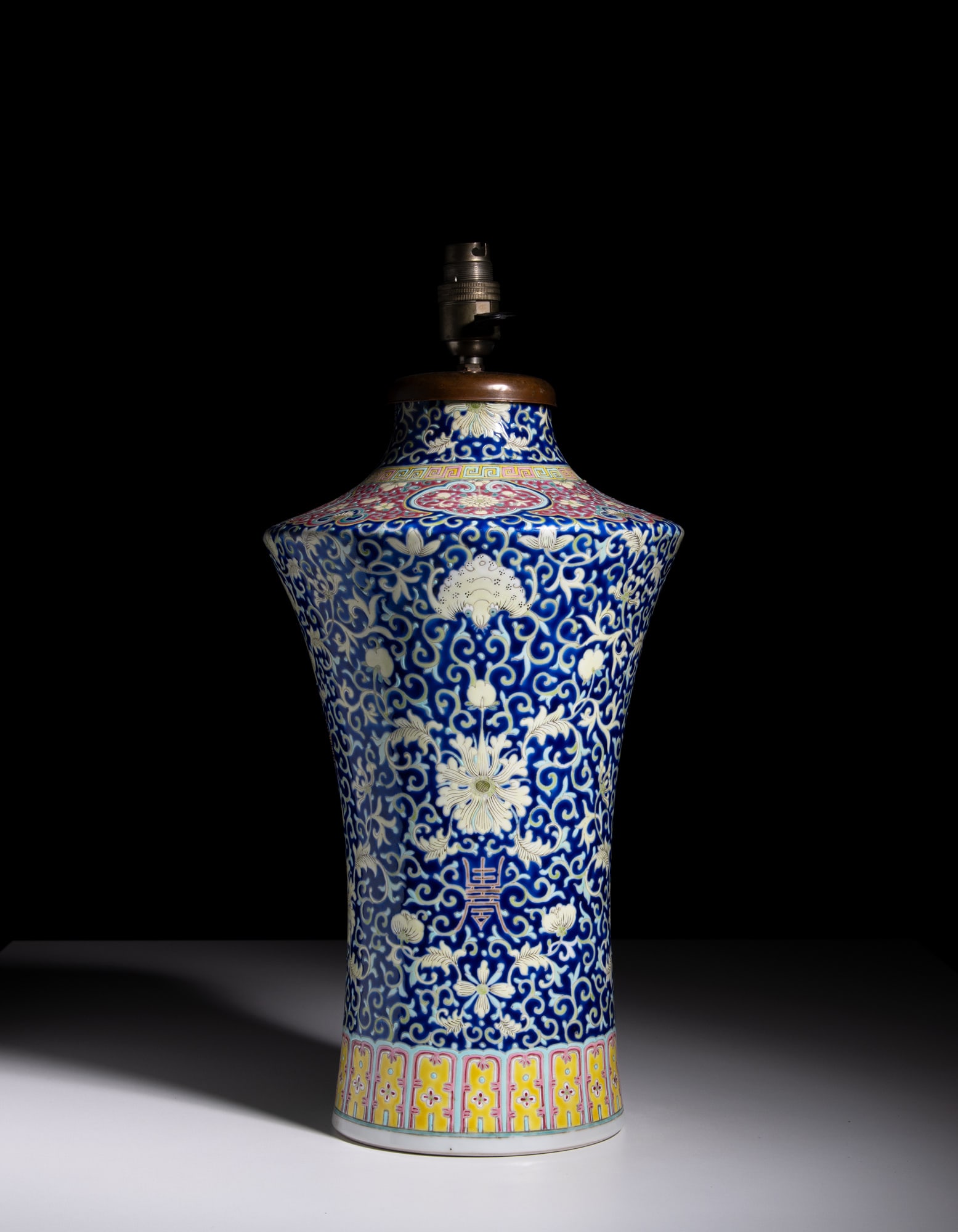 A FAMILLE ROSE BLUE GROUND WAISTED CYLINDRICAL FORM 'LOTUS' VASE, MARK 'ZONG HOU TANG JIA CANG' (1 of 3)