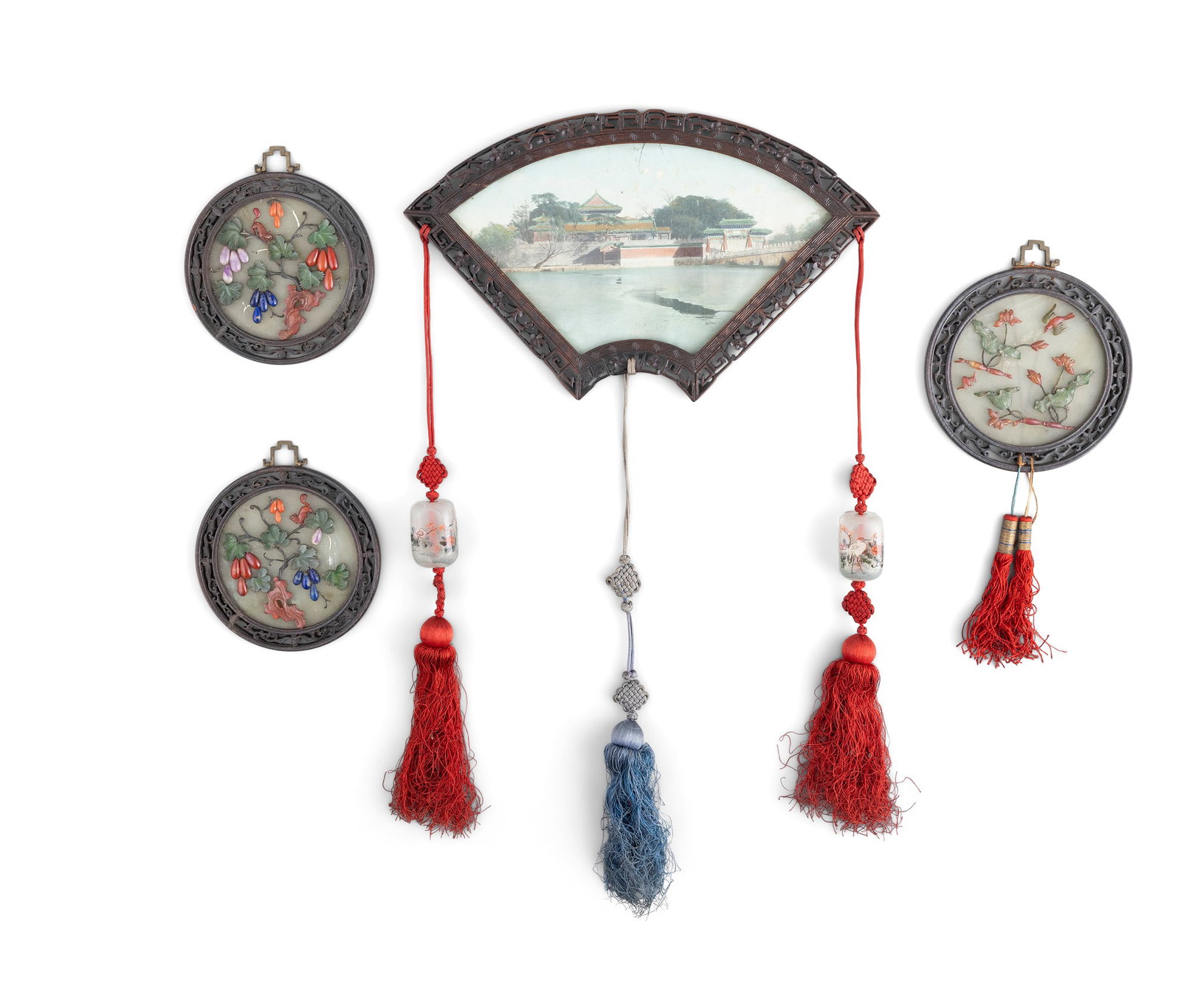A FAN-SHAPED CARVED HARDWOOD FRAME AND THREE CIRCULAR SOPASTONE INLAID ROUNDELS China, 20th century (1 of 8)