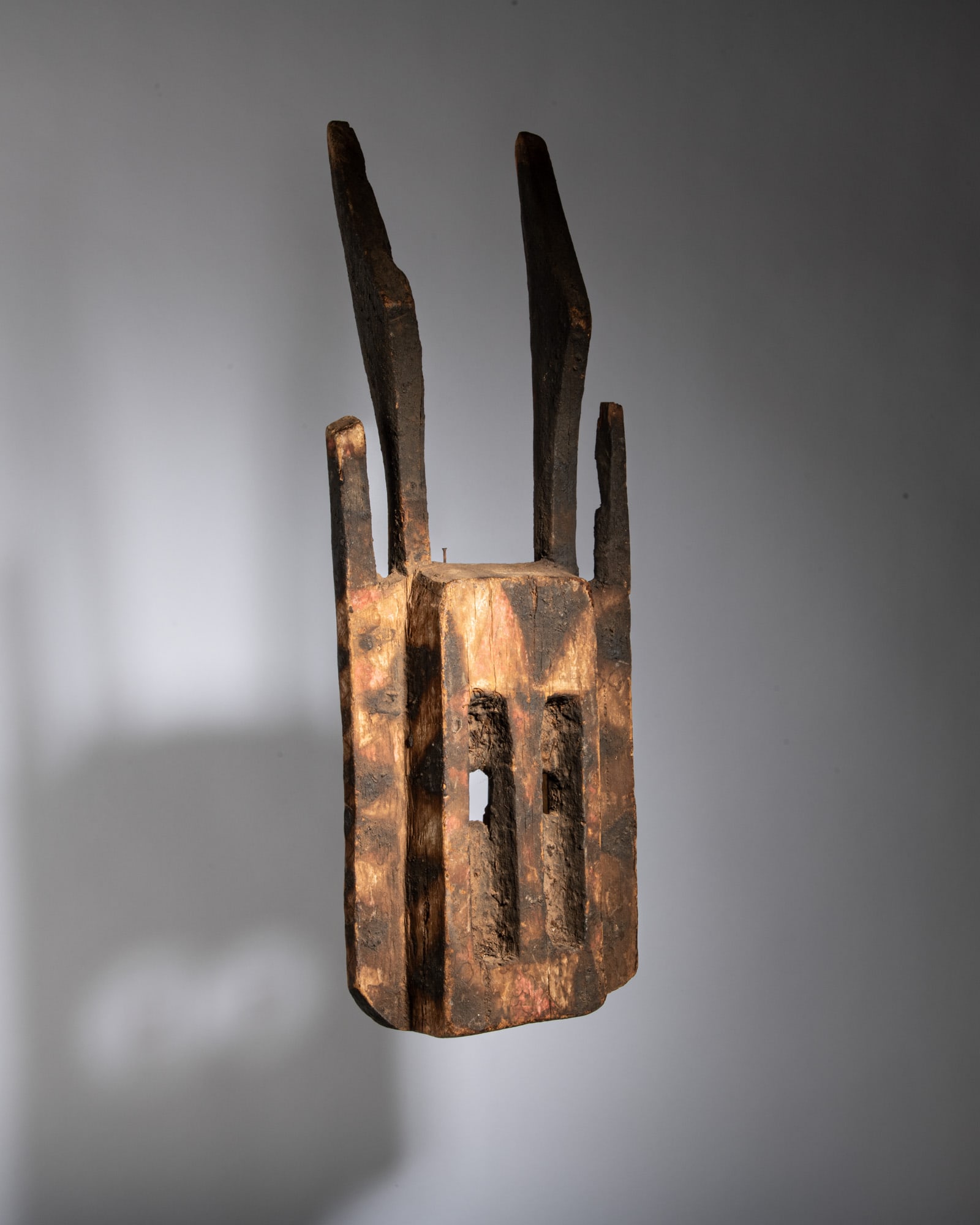 A CLASSICAL DOGON ANTELOPE CEREMONIAL MASK Dogon People / Mali Wood and aged pigments This: A CLASSICAL DOGON ANTELOPE CEREMONIAL MASK Dogon People / Mali Wood and aged pigments This imposing and masterfully carved ritual mask epitomizes the architectural and symbolic power of Dogon sculptur