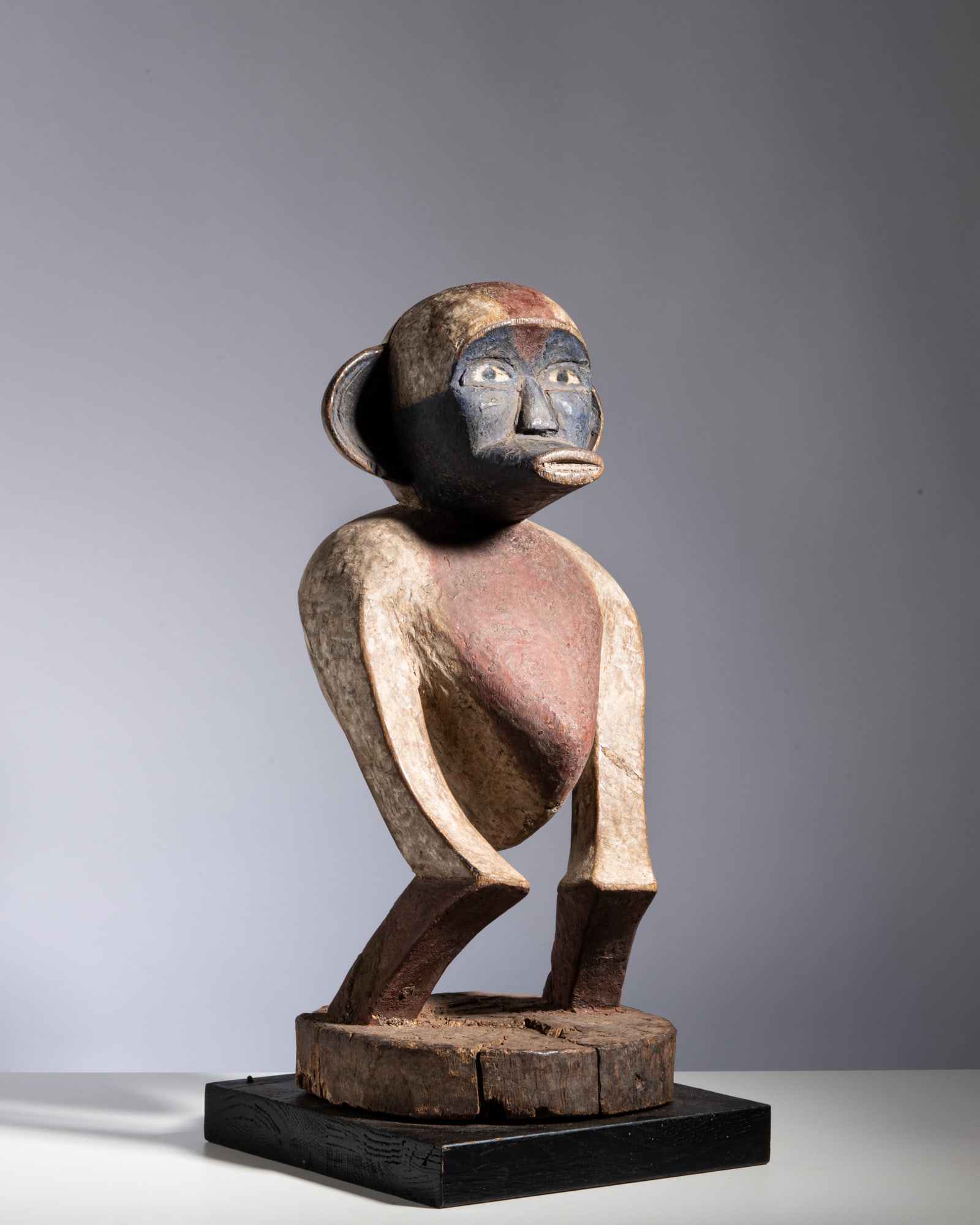 A LUMBO MATTE MONKEY POWER FIGURE Gabon Wood, glass, and pigment This rare and highly (1 of 5)