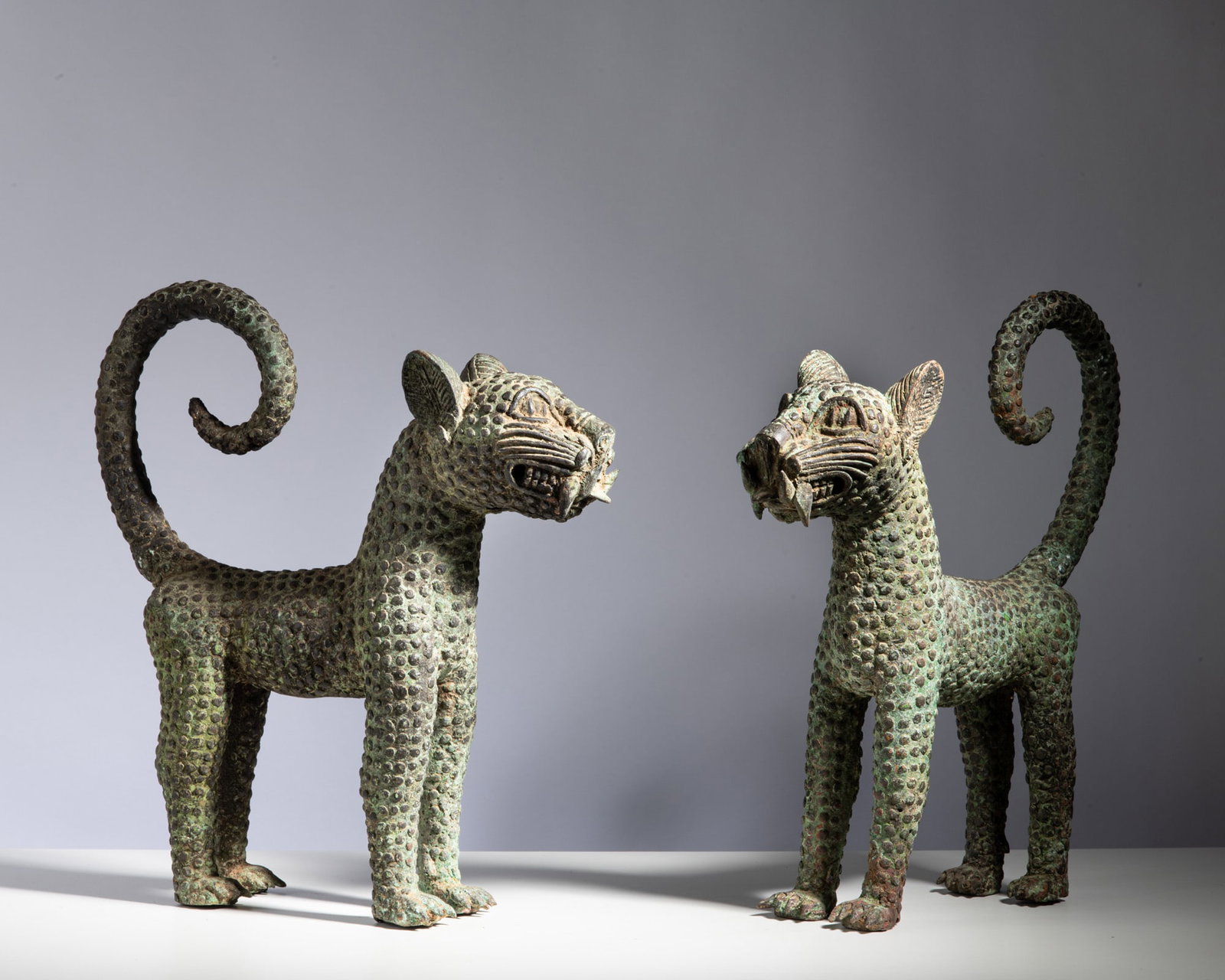 A MAGNIFICENT AND HIGHLY REGAL PAIR OF BENIN BRONZE LEOPARDS Benin Kingdom / Nigeria Bronze This (1 of 4)