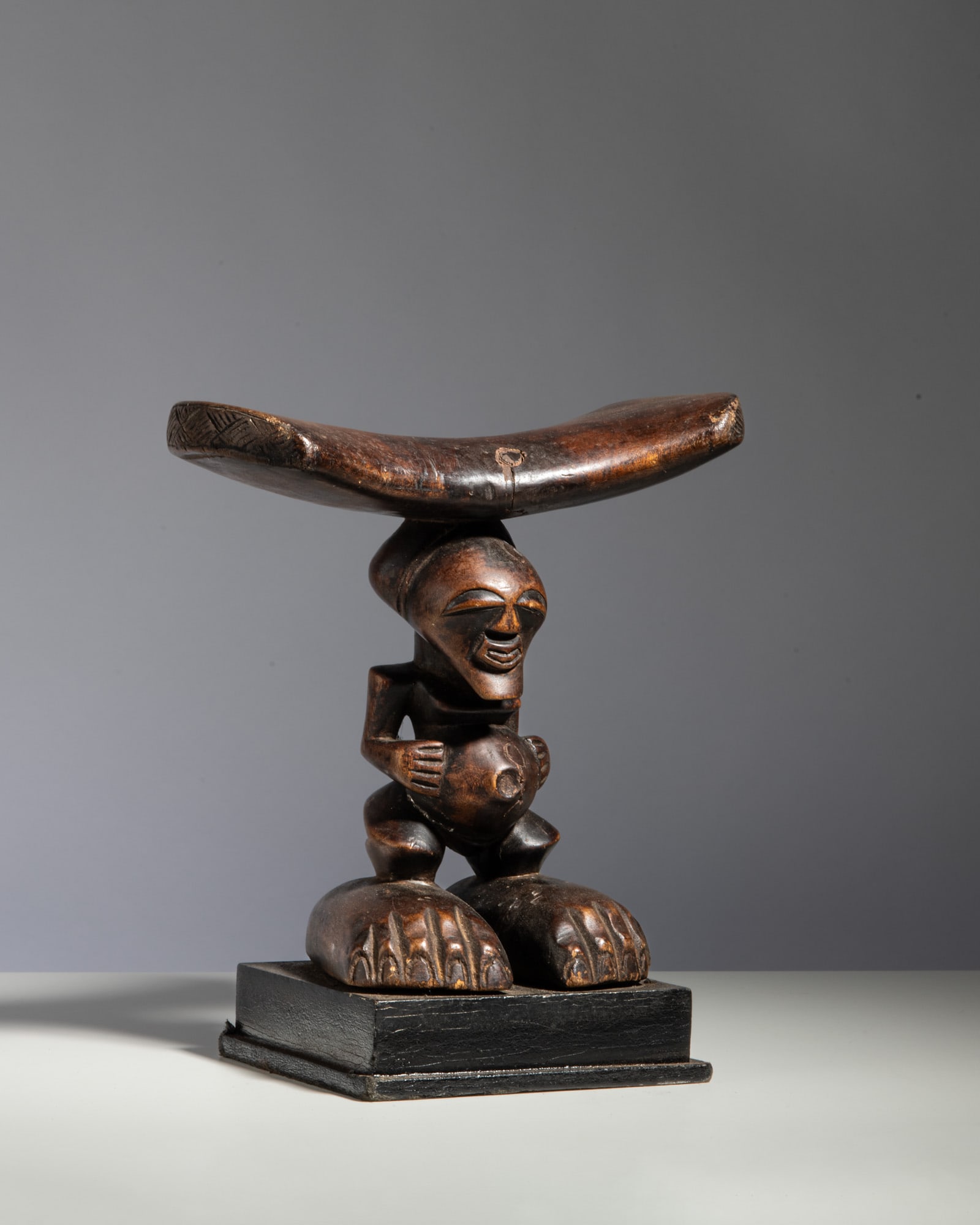 A SONGYE NECKREST Democratic Republic of the Congo Wood This exceptionally rare and sculptural (1 of 2)