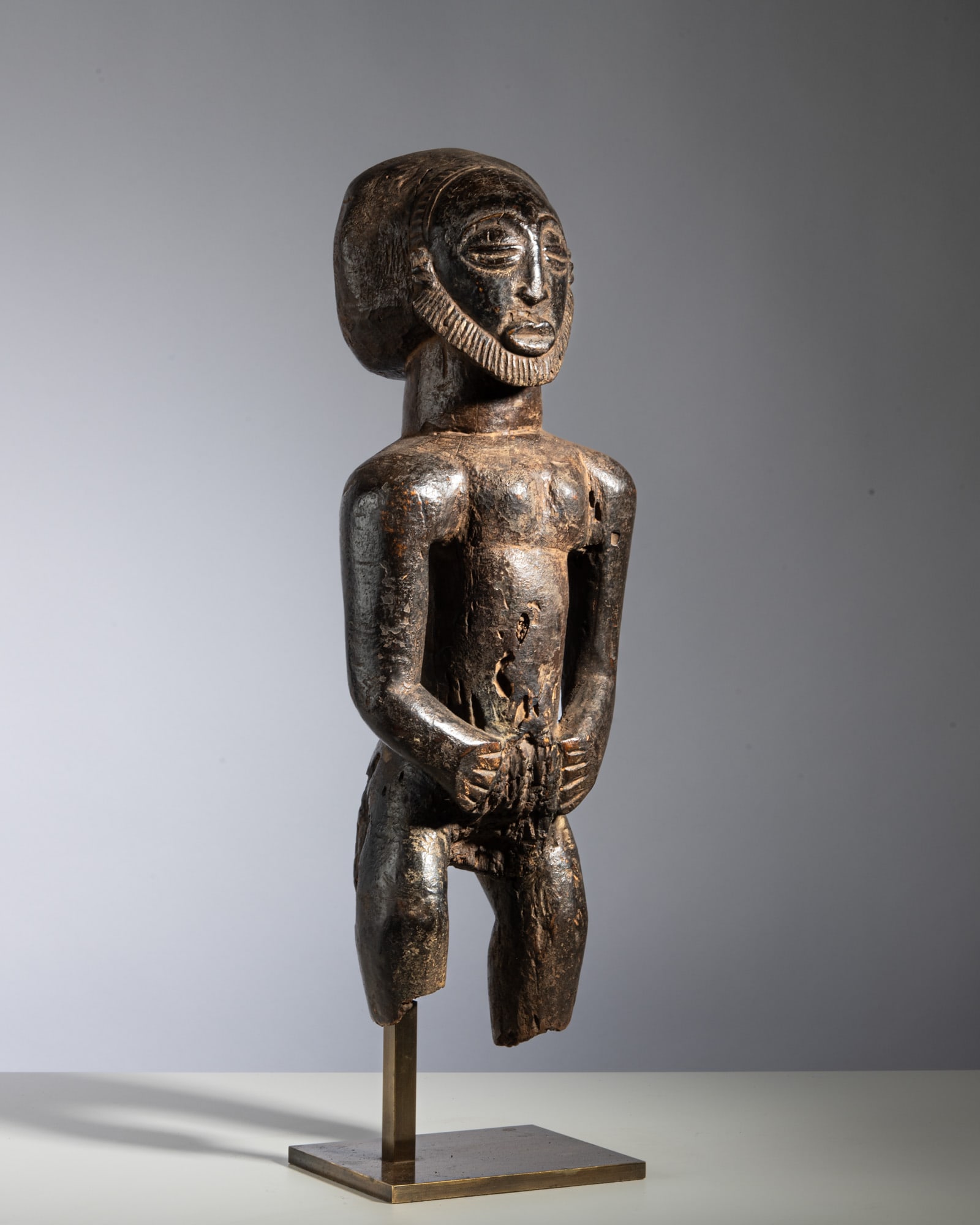 A LUBA STANDING MALE FIGURE Democratic Republic of the Congo Wood This exceptionally powerful (1 of 2)