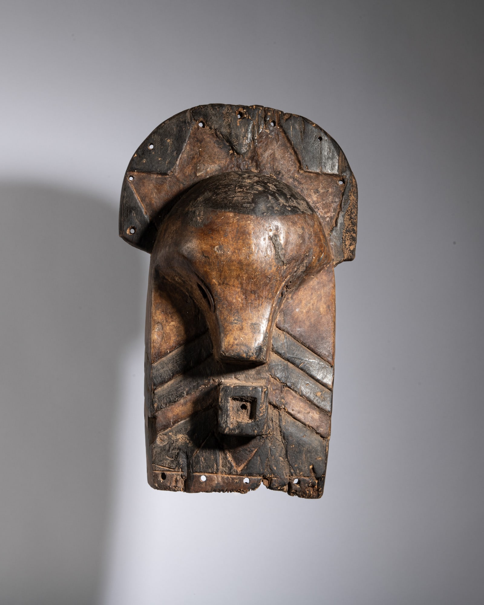 A CLASSICAL LUBA RITUAL MASK Democratic Republic of the Congo Wood and kaolin This striking and (1 of 3)