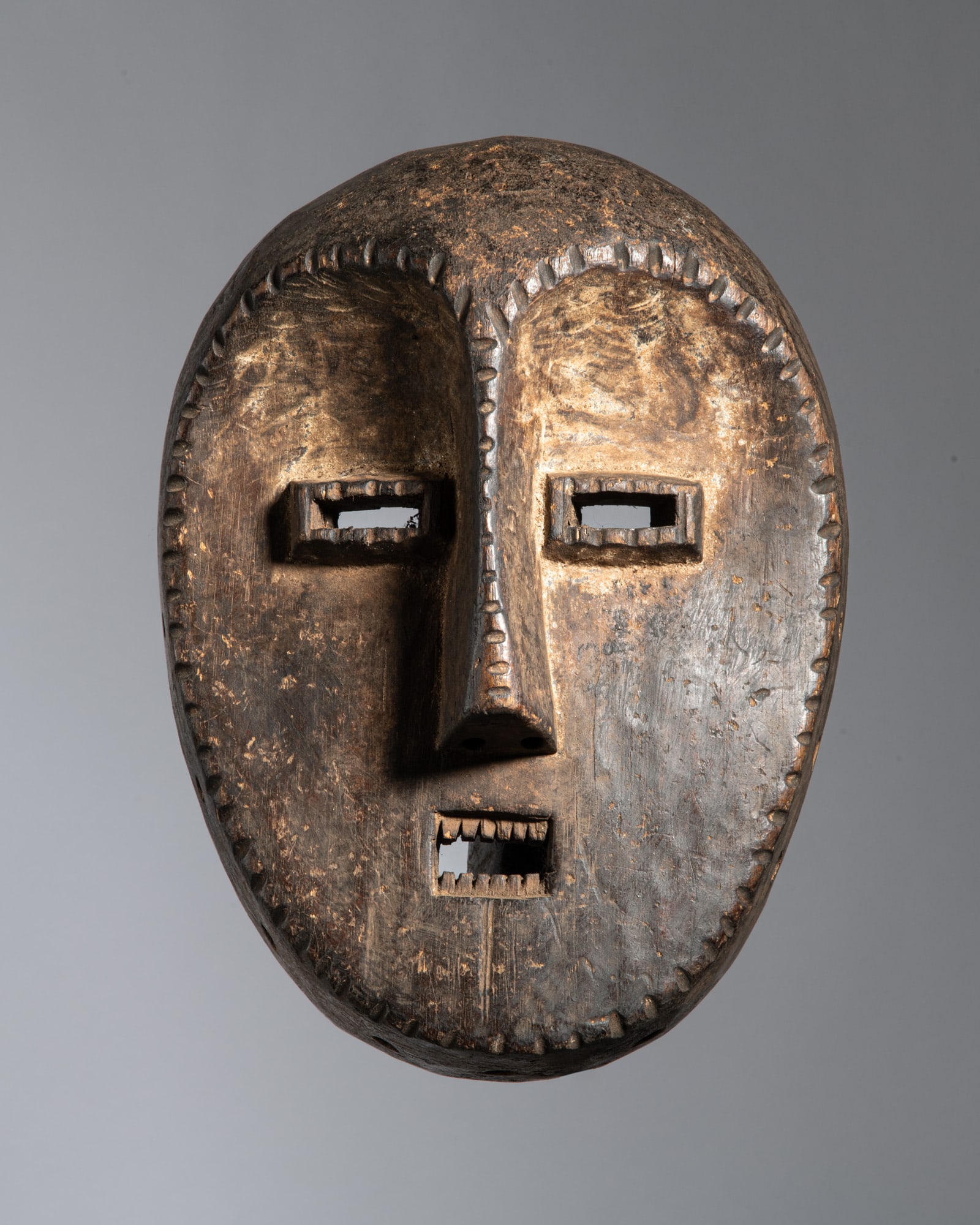 A CLASSICAL LEGA IDIMU RITUAL MASK Democratic Republic of the Congo Wood and kaolin This (1 of 3)