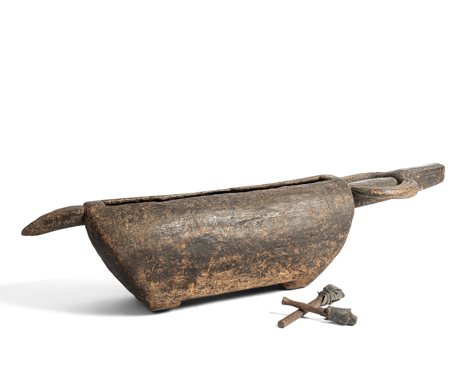 A STYLIZED BOVINE-FORM CEREMONIAL IGOGO SLIT DRUM Central African Republic Wood and aged pigments (1 of 7)