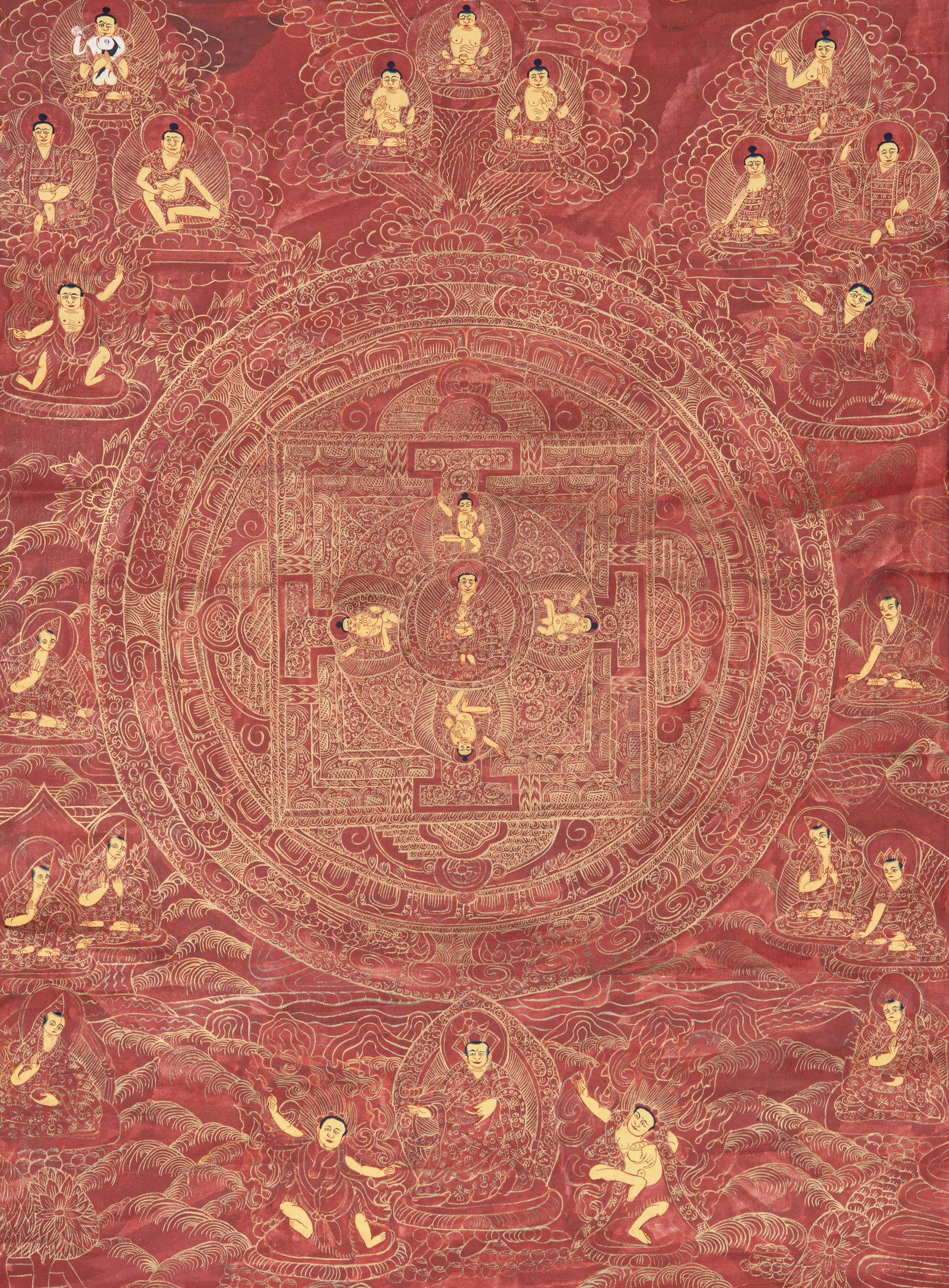 A THANGKA ON CLOTH DEPICTING THE MANDALA OF PADMASAMBHAVA. Nepal, 20th Century Painted in gold on : A THANGKA ON CLOTH DEPICTING THE MANDALA OF PADMASAMBHAVA. Nepal, 20th Century Painted in gold on a red ground. With a black silk brocade mount. Dim. 43 x 34 cm Provenance: from the collection of a pr