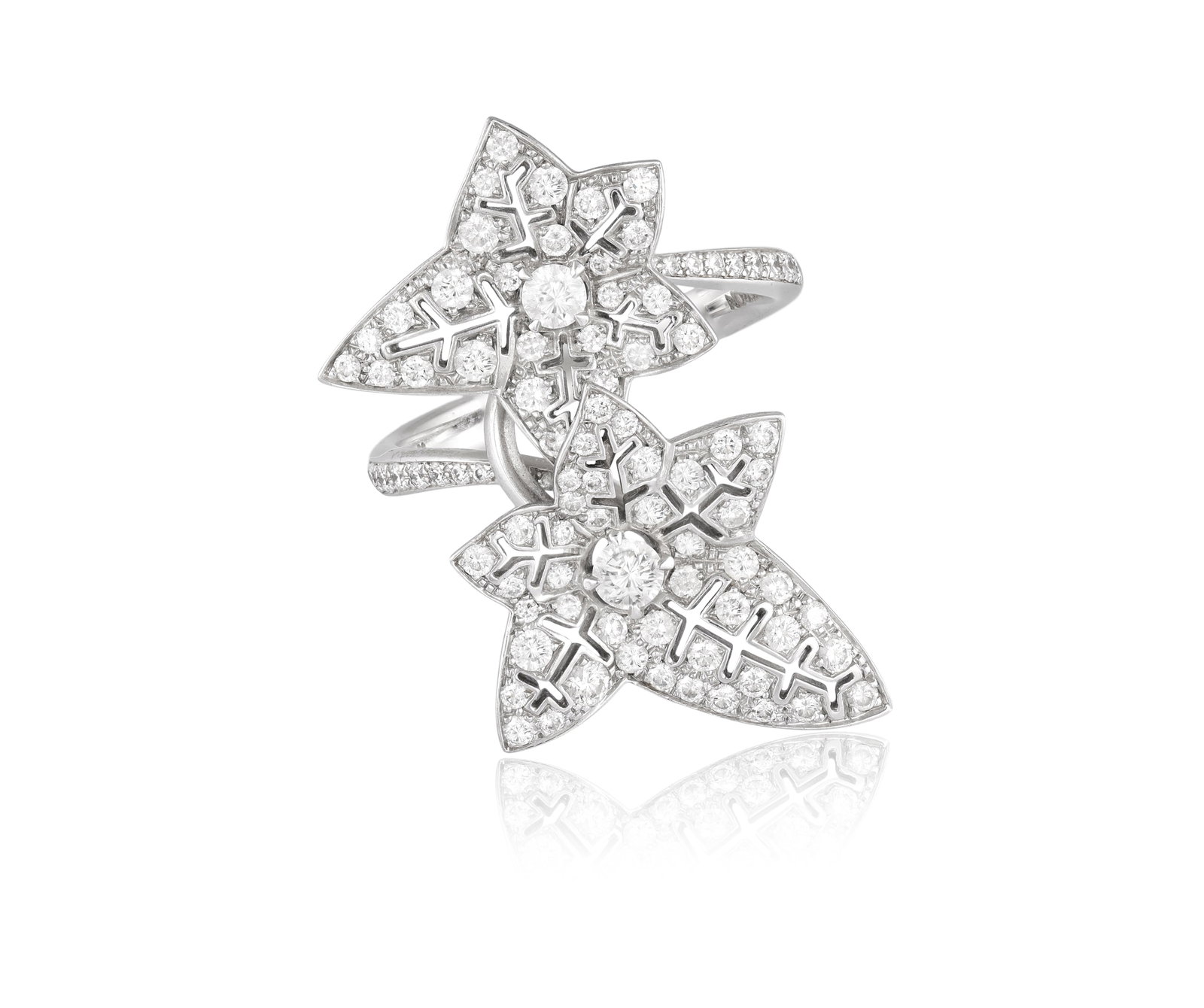 BOUCHERON: A DIAMOND 'LIERRE' DRESS RING Of crossover ivy leaf design, pavé-set with: BOUCHERON: A DIAMOND 'LIERRE' DRESS RING Of crossover ivy leaf design, pavé-set with brilliant-cut diamonds throughout, between similarly-cut diamond shoulders, mounted in 18K gold, signed Bouche