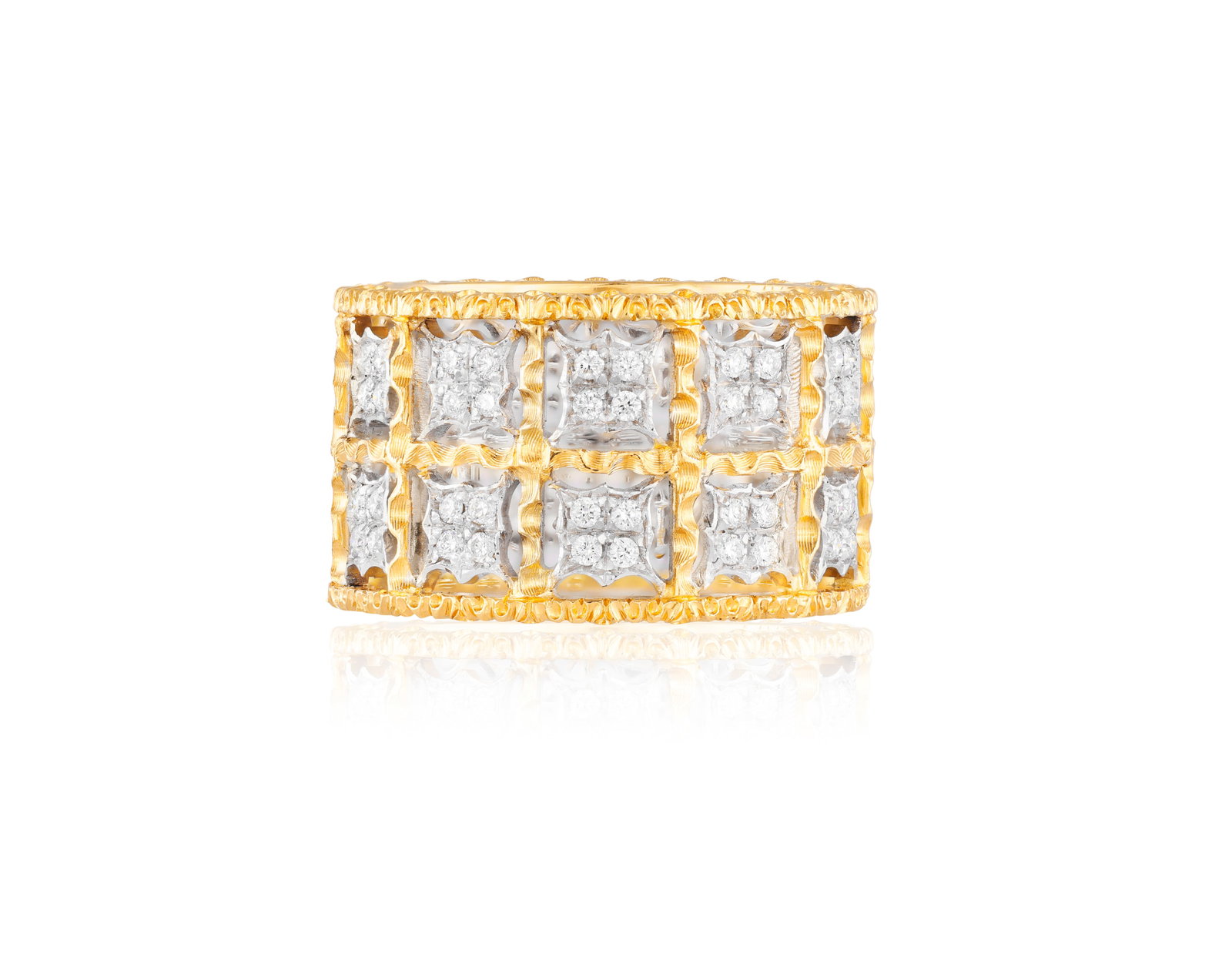 BUCCELLATI: A DIAMOND RING Of bi-coloured design, formed as a continuous openwork lattice, accented: BUCCELLATI: A DIAMOND RING Of bi-coloured design, formed as a continuous openwork lattice, accented by series of brilliant-cut diamonds, between textured borders, mounted in 18K gold, diamonds approxi