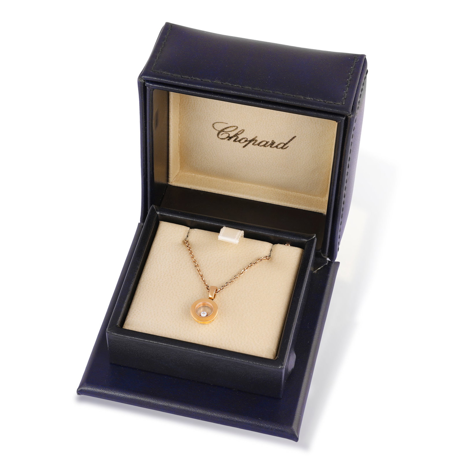 CHOPARD: A 'HAPPY DIAMONDS' PENDANT ON CHAIN The circular-shaped pendant with glazed compartment: CHOPARD: A 'HAPPY DIAMONDS' PENDANT ON CHAIN The circular-shaped pendant with glazed compartment revealing a collet-set 'floating' brilliant-cut diamond, suspended from a cable-link chain with 'C' log