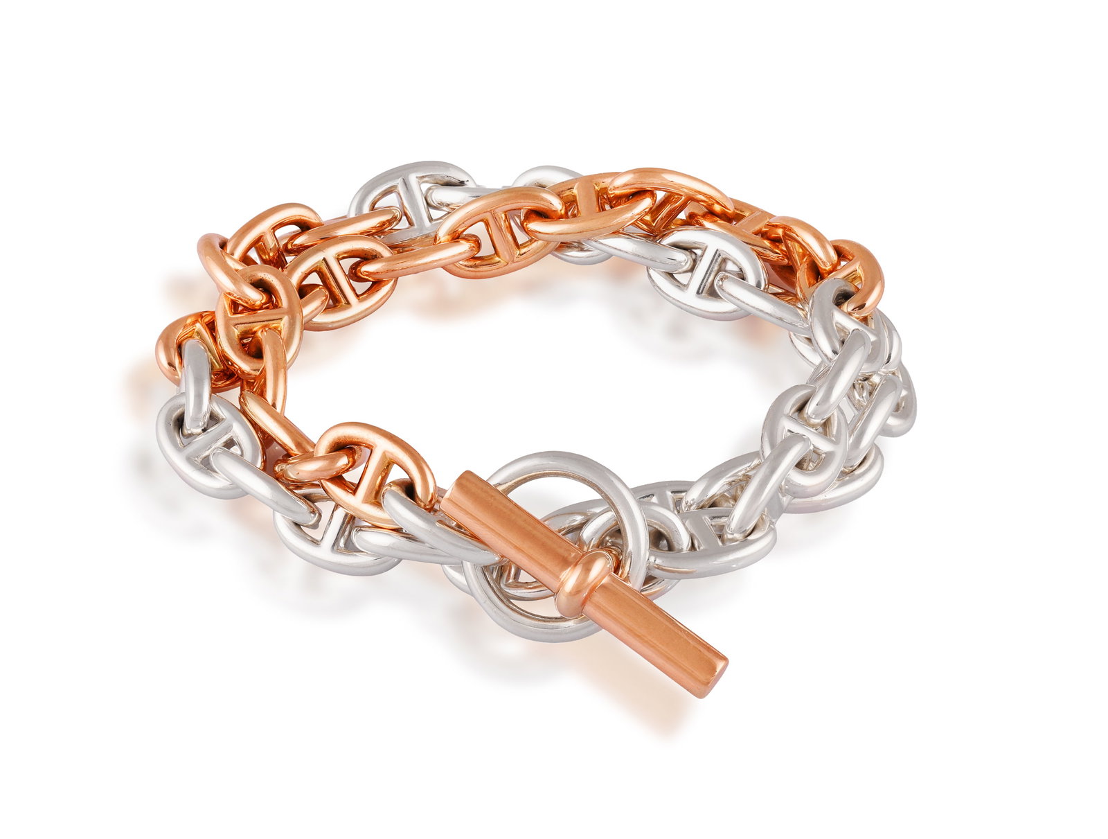 HERMÈS: A ‘CHAÎNE D’ANCRE DOUBLE TOUR’ BRACELET, 2026 Of bi-coloured: HERMÈS: A ‘CHAÎNE D’ANCRE DOUBLE TOUR’ BRACELET, 2026 Of bi-coloured anchor-link chain design, terminating into a toggle clasp, in 18K rose gold and silver, signed Hermès, numbered, with make
