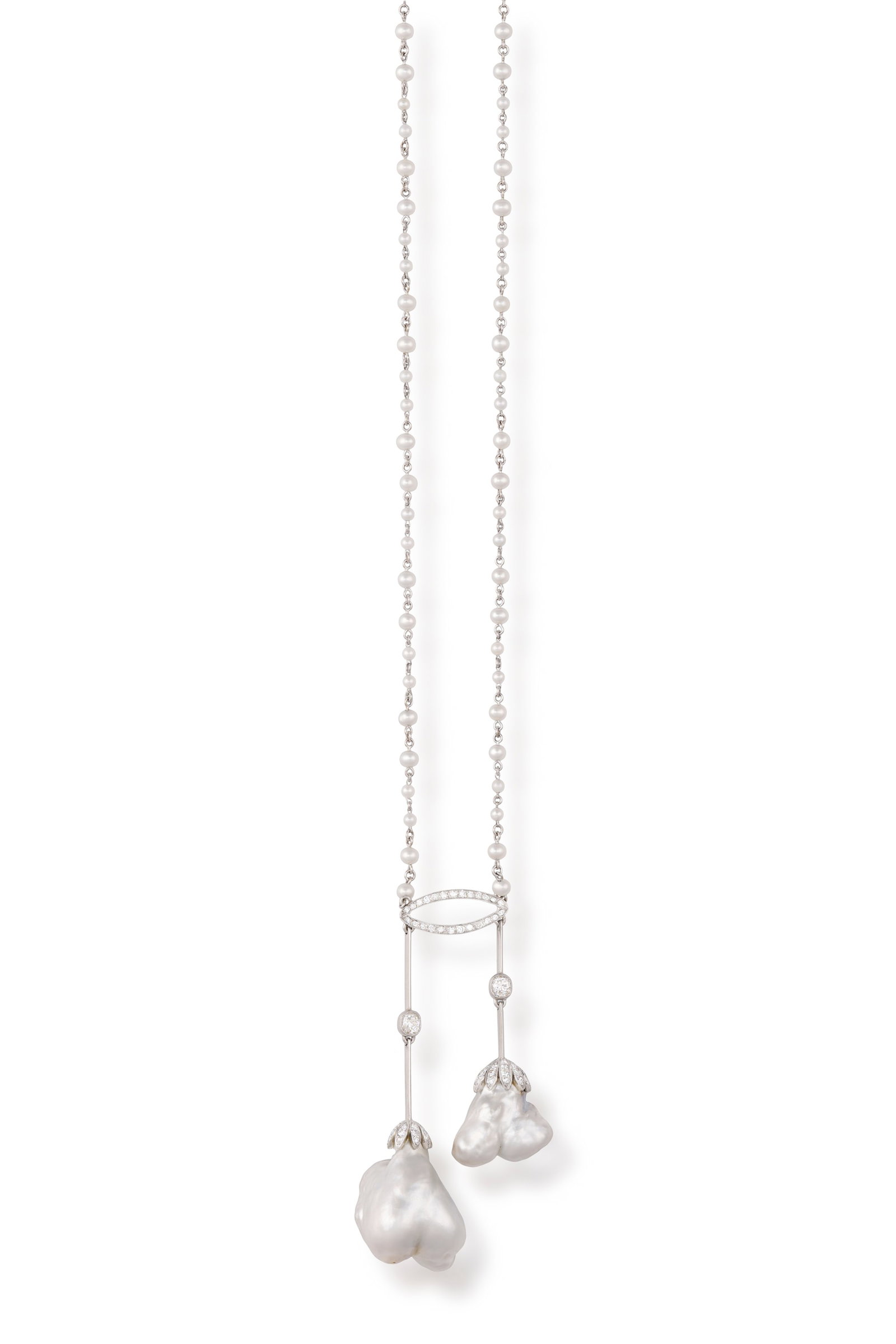 AN EARLY 20TH CENTURY NATURAL BLISTER PEARL AND DIAMOND NÉGLIGÉ NECKLACE The two baroque: AN EARLY 20TH CENTURY NATURAL BLISTER PEARL AND DIAMOND NÉGLIGÉ NECKLACE The two baroque drop-shaped natural blister pearls capped by single-cut diamonds, suspending from knife-edge linking 