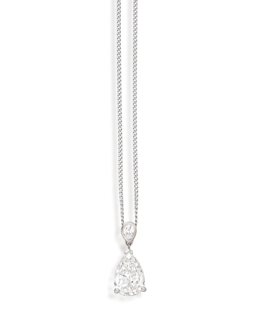 A DIAMOND PENDANT ON CHAIN The old pear-shaped diamond weighing approximately 2.80cts within a (1 of 4)