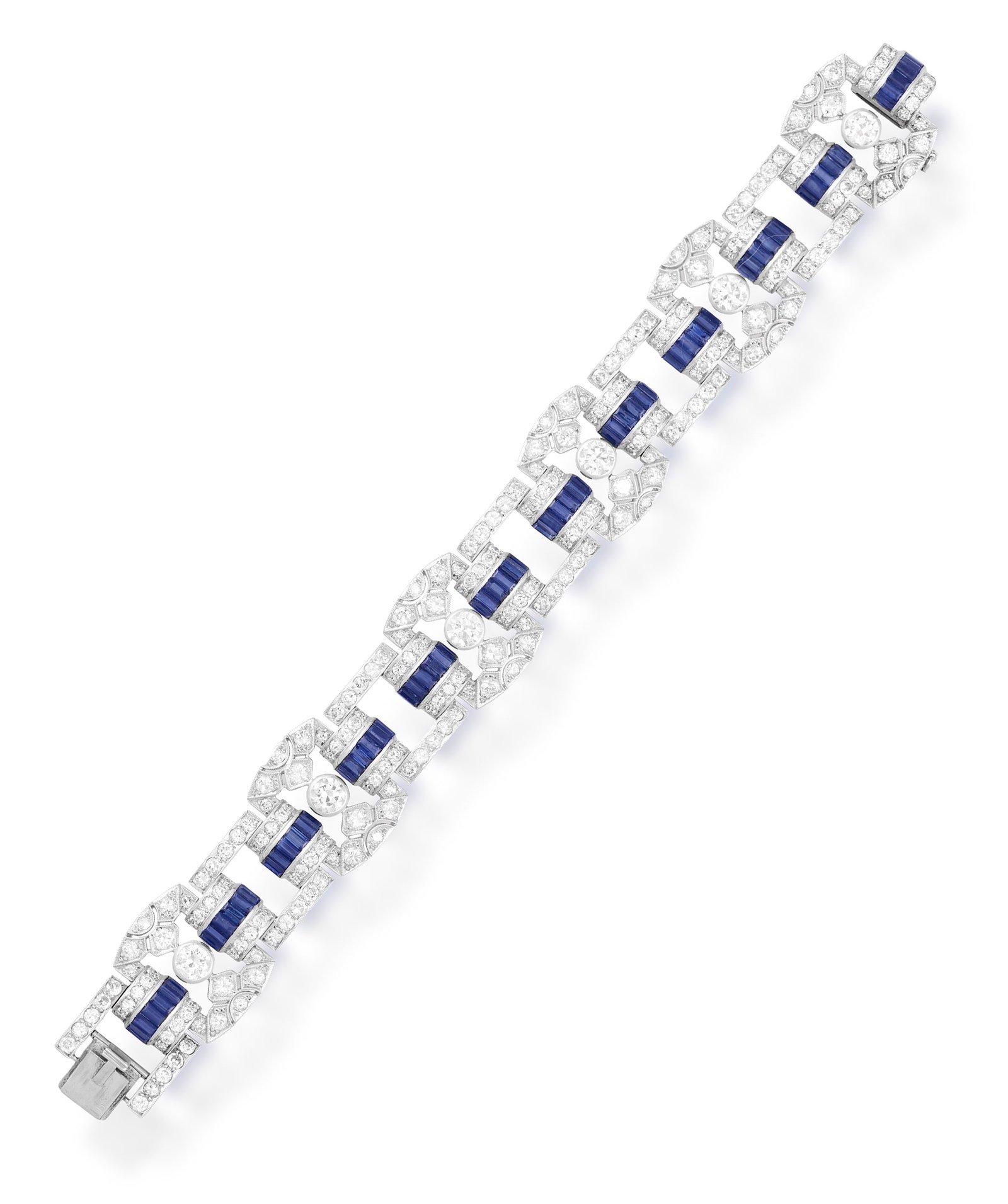 AN ART DECO SAPPHIRE AND DIAMOND BRACELET Composed of a series of pierced, geometric openwork (1 of 4)