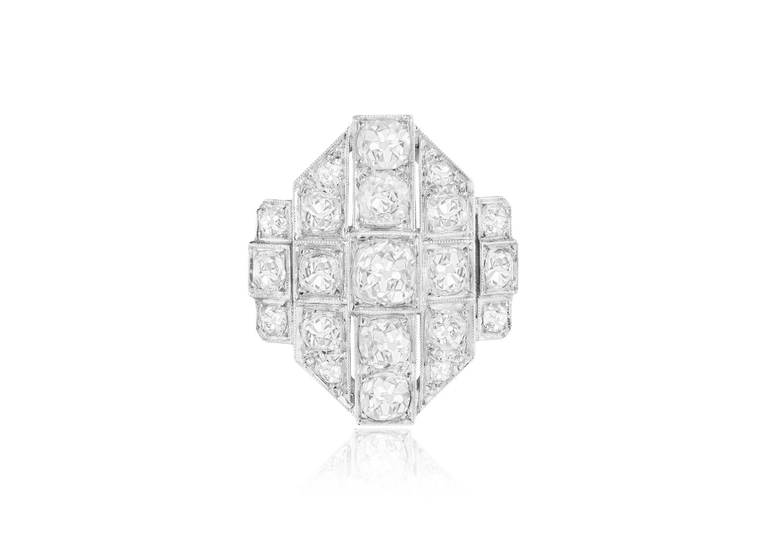 AN ART DECO DIAMOND DRESS RING, FRENCH, CIRCA 1920 Of geometric lattice design, set throughout with: AN ART DECO DIAMOND DRESS RING, FRENCH, CIRCA 1920 Of geometric lattice design, set throughout with old-cut diamonds, within millegrain setting, mounted in platinum and 18K gold, diamonds approximatel