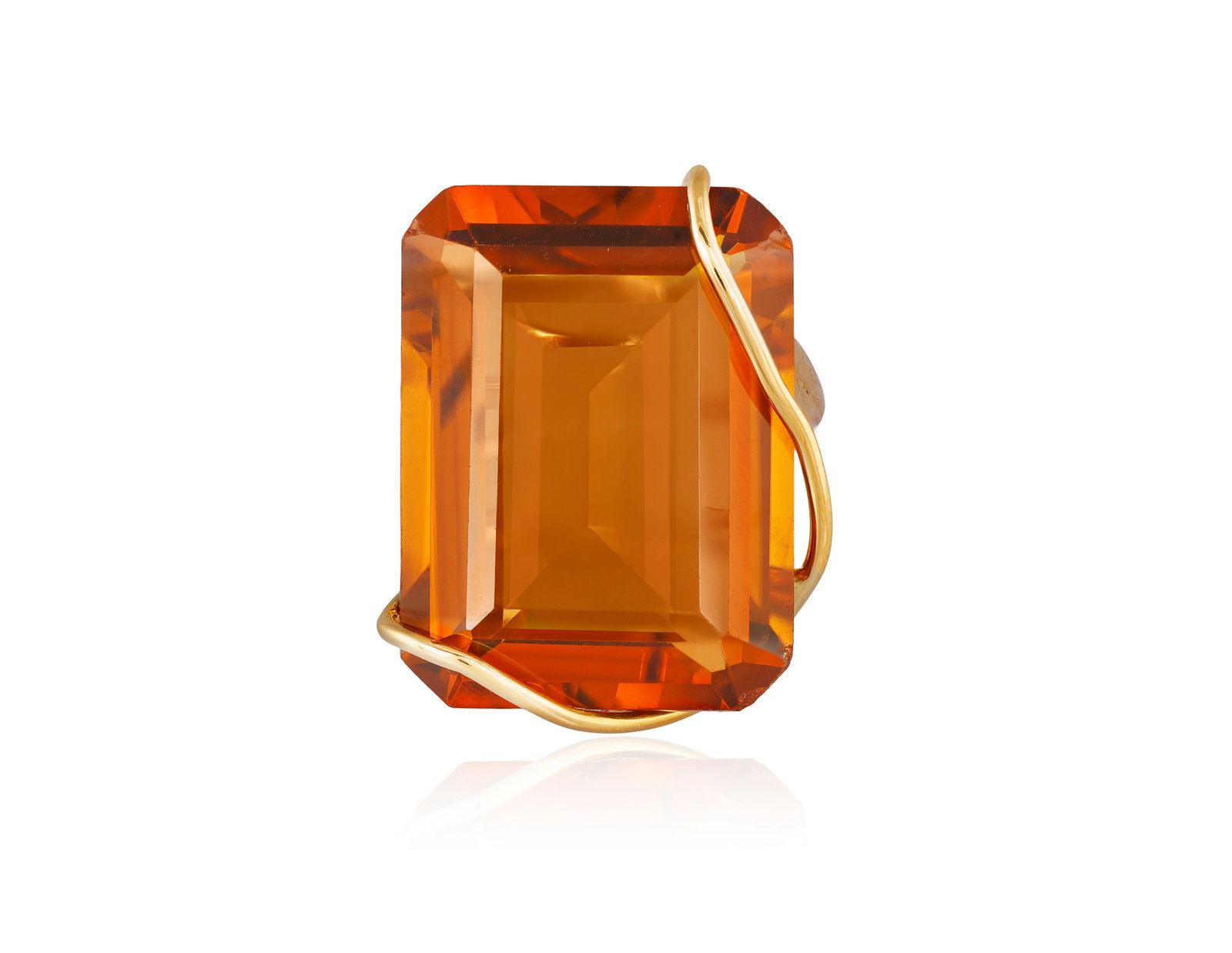 A CITRINE DRESS RING The rectangular-cut citrine weighing approximately 28.00cts, wrapped within: A CITRINE DRESS RING The rectangular-cut citrine weighing approximately 28.00cts, wrapped within wire mount, to a bifurcated hoop, mounted in 18K gold, Italian registry mark, French import mark, ring 