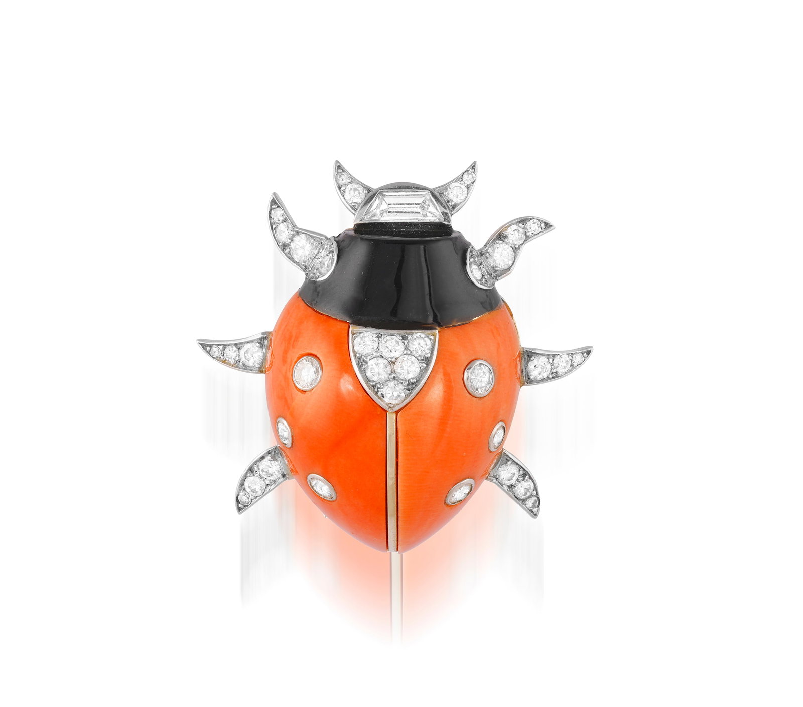 CARTIER: A RARE AND COLLECTABLE CORAL, ENAMEL AND DIAMOND NOVELTY PENDANT/BROOCH, CIRCA 1969: CARTIER: A RARE AND COLLECTABLE CORAL, ENAMEL AND DIAMOND NOVELTY PENDANT/BROOCH, CIRCA 1969 Designed as a ladybug, the coral wings decorated with collet-set diamonds, with black enamel and diamond-se