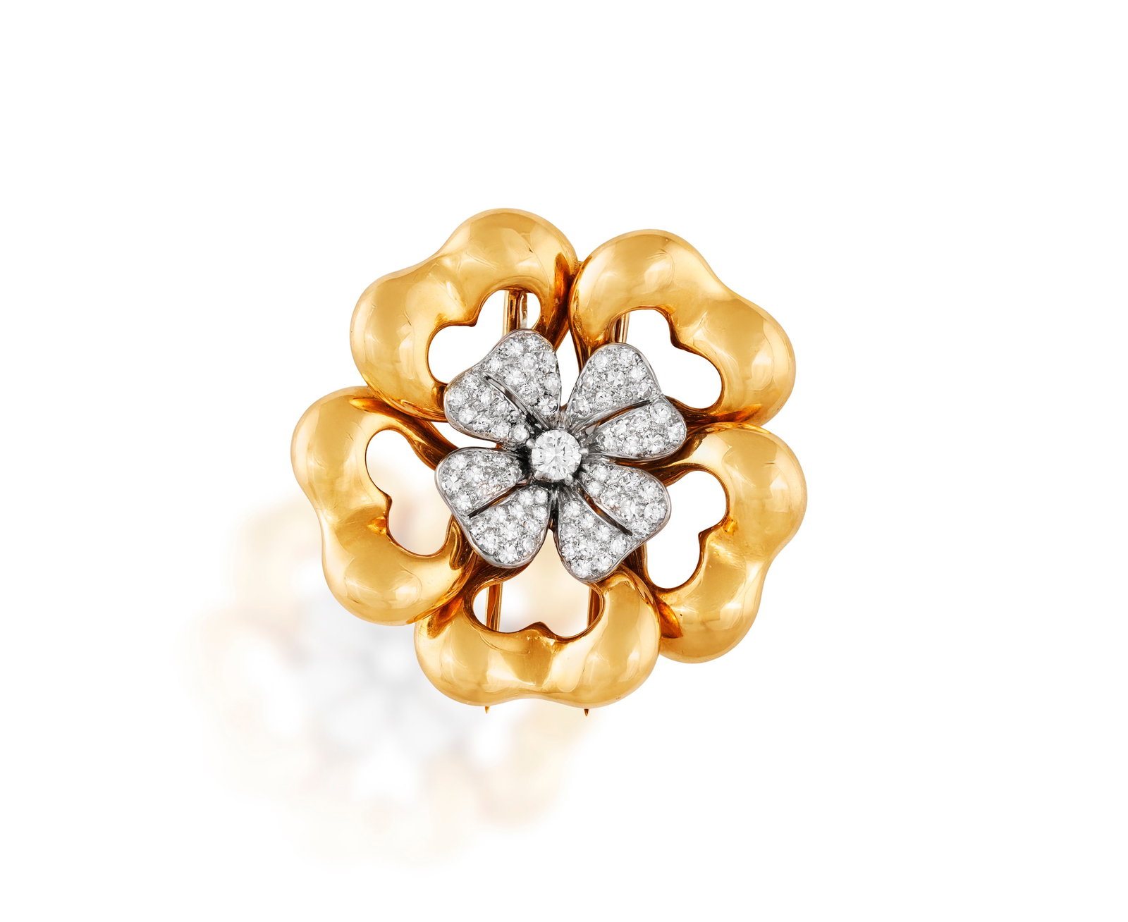 BULGARI: A DIAMOND BROOCH, CIRCA 1950 Of openwork flowerhead design, centring a brilliant-cut: BULGARI: A DIAMOND BROOCH, CIRCA 1950 Of openwork flowerhead design, centring a brilliant-cut diamond with single-cut diamond petals, within a polished gold petal frame, mounted in 18K gold, signed Bv