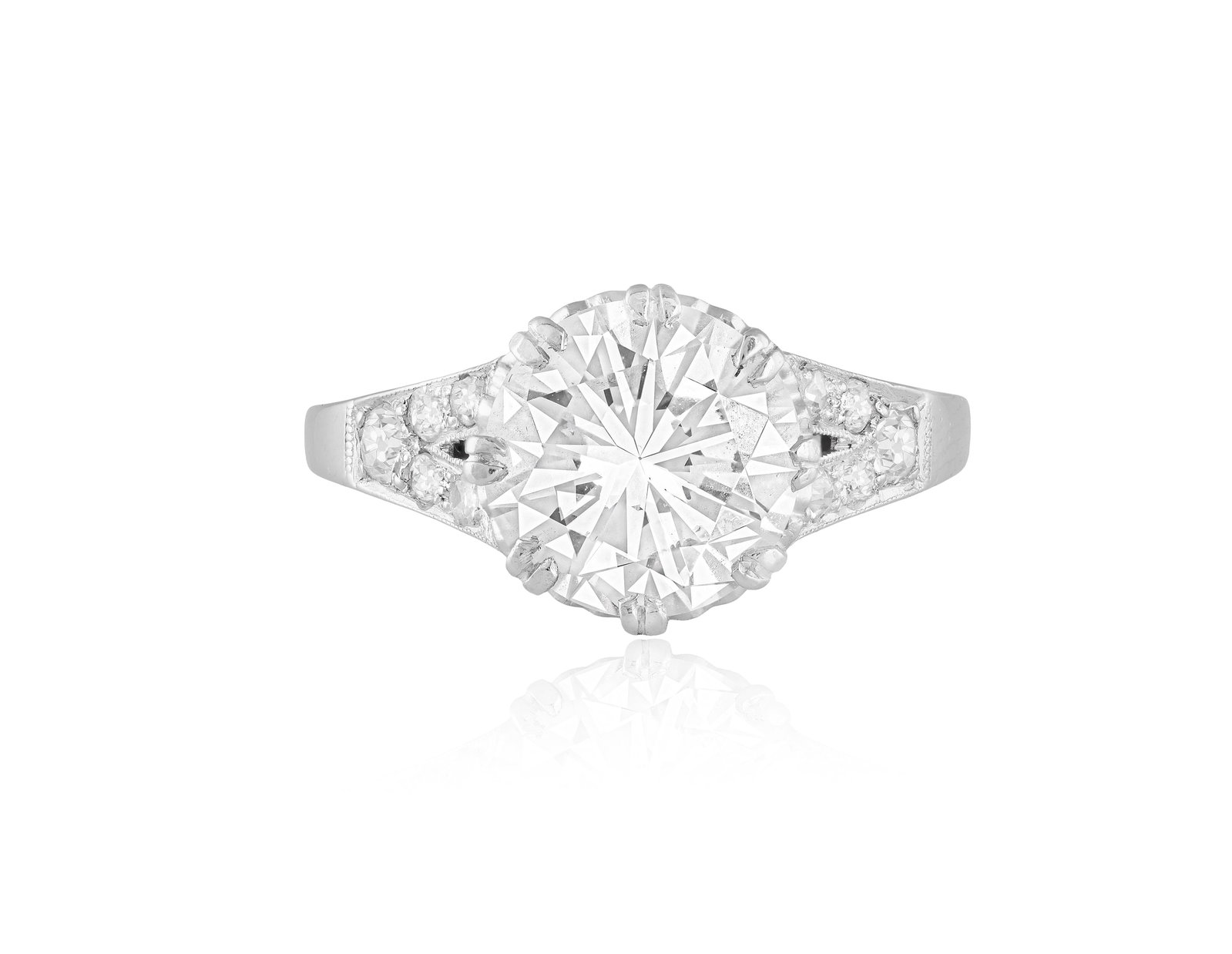 AN EARLY 20TH CENTURY DIAMOND SINGLE-STONE RING Set with a transitional-cut diamond weighing (1 of 5)