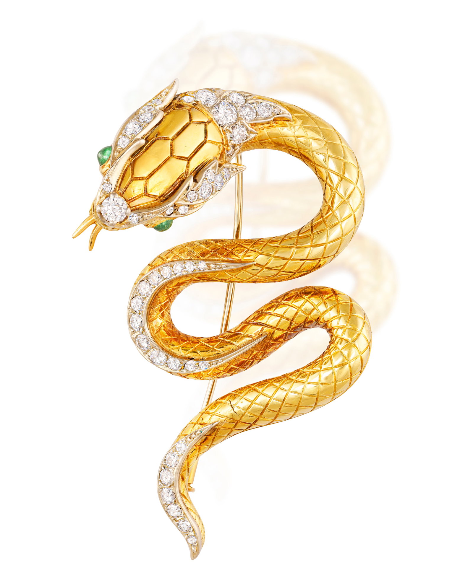 MEISTER: AN EMERALD AND DIAMOND SERPENT BROOCH, CIRCA 1968 The realistically modelled snake with: MEISTER: AN EMERALD AND DIAMOND SERPENT BROOCH, CIRCA 1968 The realistically modelled snake with brilliant and single-cut diamond highlights, circular-cut emerald cabochon eyes, with engraved body and
