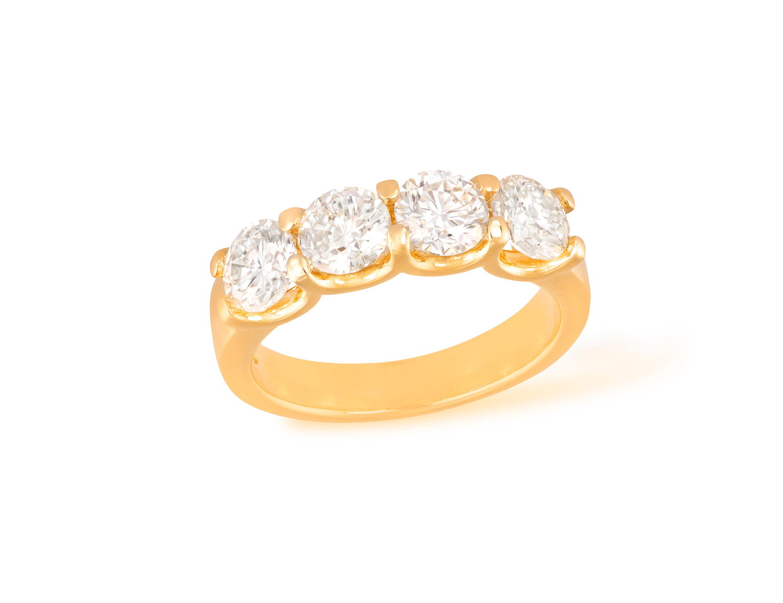 A DIAMOND FOUR-STONE RING The frontispiece set with four brilliant-cut diamonds, within: A DIAMOND FOUR-STONE RING The frontispiece set with four brilliant-cut diamonds, within claw-setting, mounted in 18K gold, diamonds approximately 2.00cts total, ring size L½