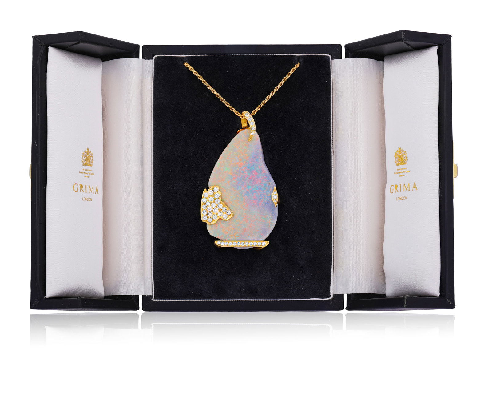ANDREW GRIMA: AN OPAL AND DIAMOND PENDANT, 1979 The boulder opal held by a pavé-set brilliant (1 of 5)