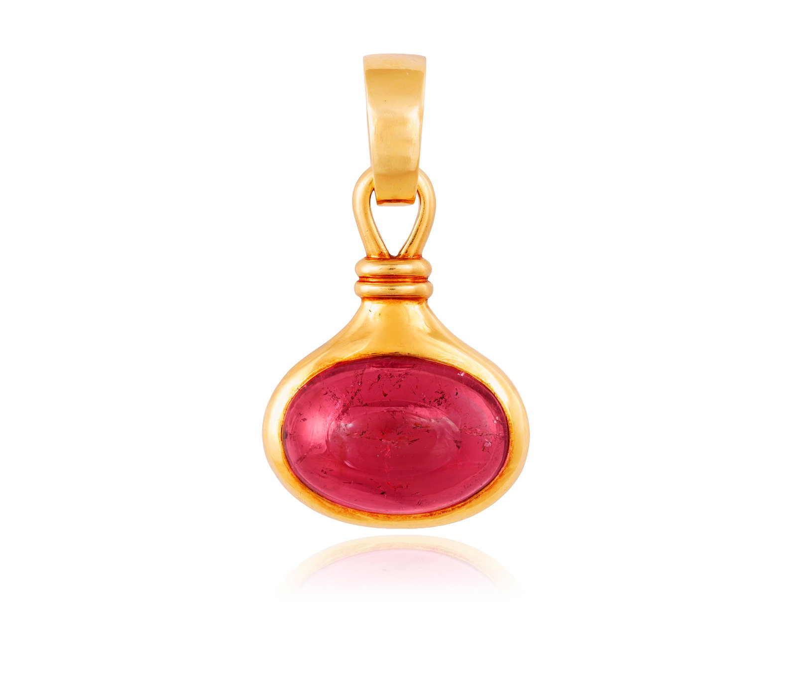 BULGARI: A RUBELLITE PENDANT, CIRCA 1985 Centring an oval-shaped rubellite tourmaline cabochon: BULGARI: A RUBELLITE PENDANT, CIRCA 1985 Centring an oval-shaped rubellite tourmaline cabochon weighing approximately 16.00cts within collet-setting, to a polished gold frame and reeded surmount, moun